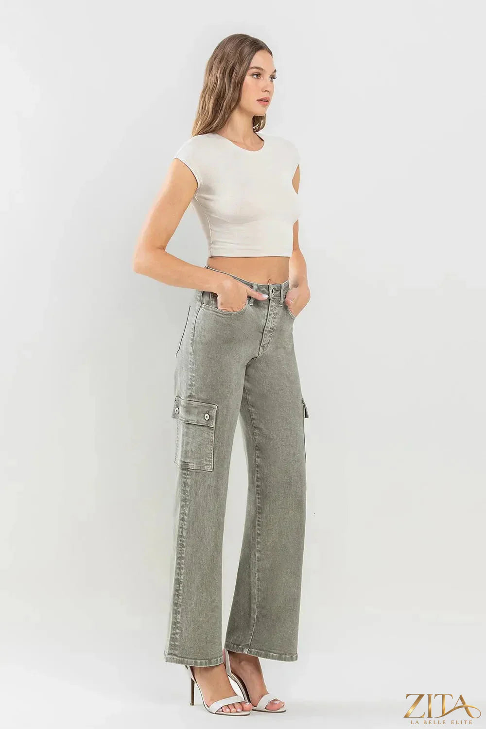 Vervet by Flying Monkey 90's super high rise cargo jeans with multiple pockets, worn by a model in a casual streetwear style
