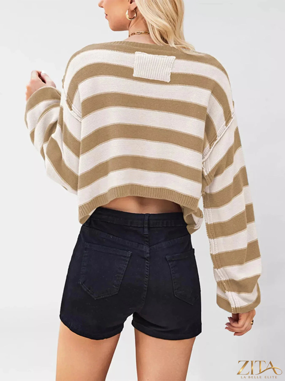 Striped boat neck sweater by Trendsi featuring classic design and comfortable fit, shown in natural striped pattern.