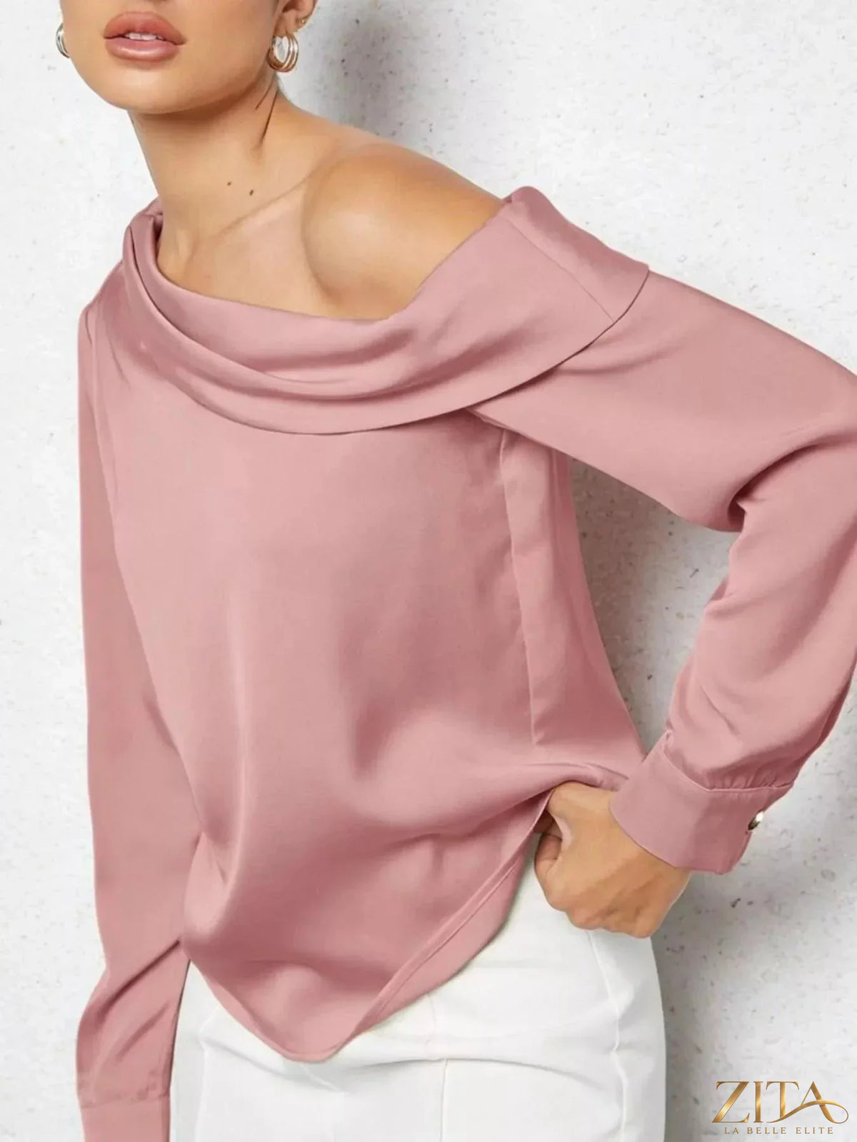 Zita La Belle Elite one-shoulder satin blouse in elegant white, showcasing smooth fabric and stylish asymmetrical design.