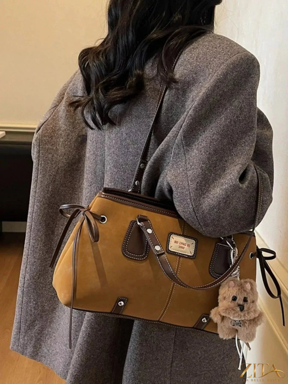 Zita La Belle Elite side tie shoulder bag featuring a sleek design and adjustable strap, perfect for stylish everyday use.
