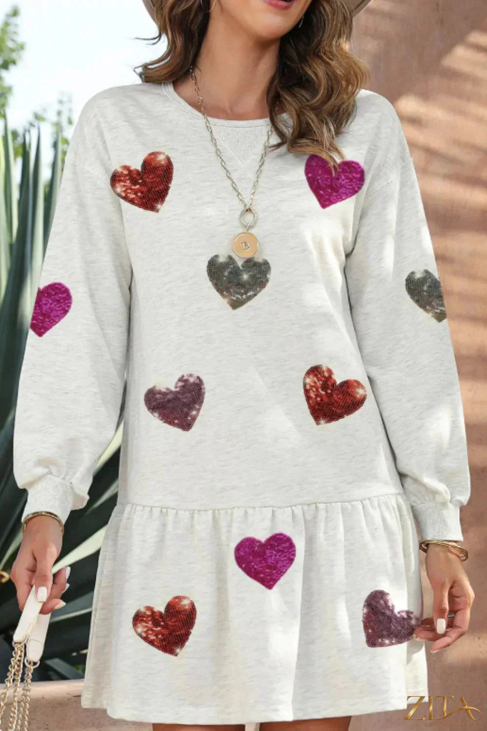 Zita La Belle Elite sequin heart round neck long sleeve mini dress, featuring a shimmering sequin heart detail and elegant fit.