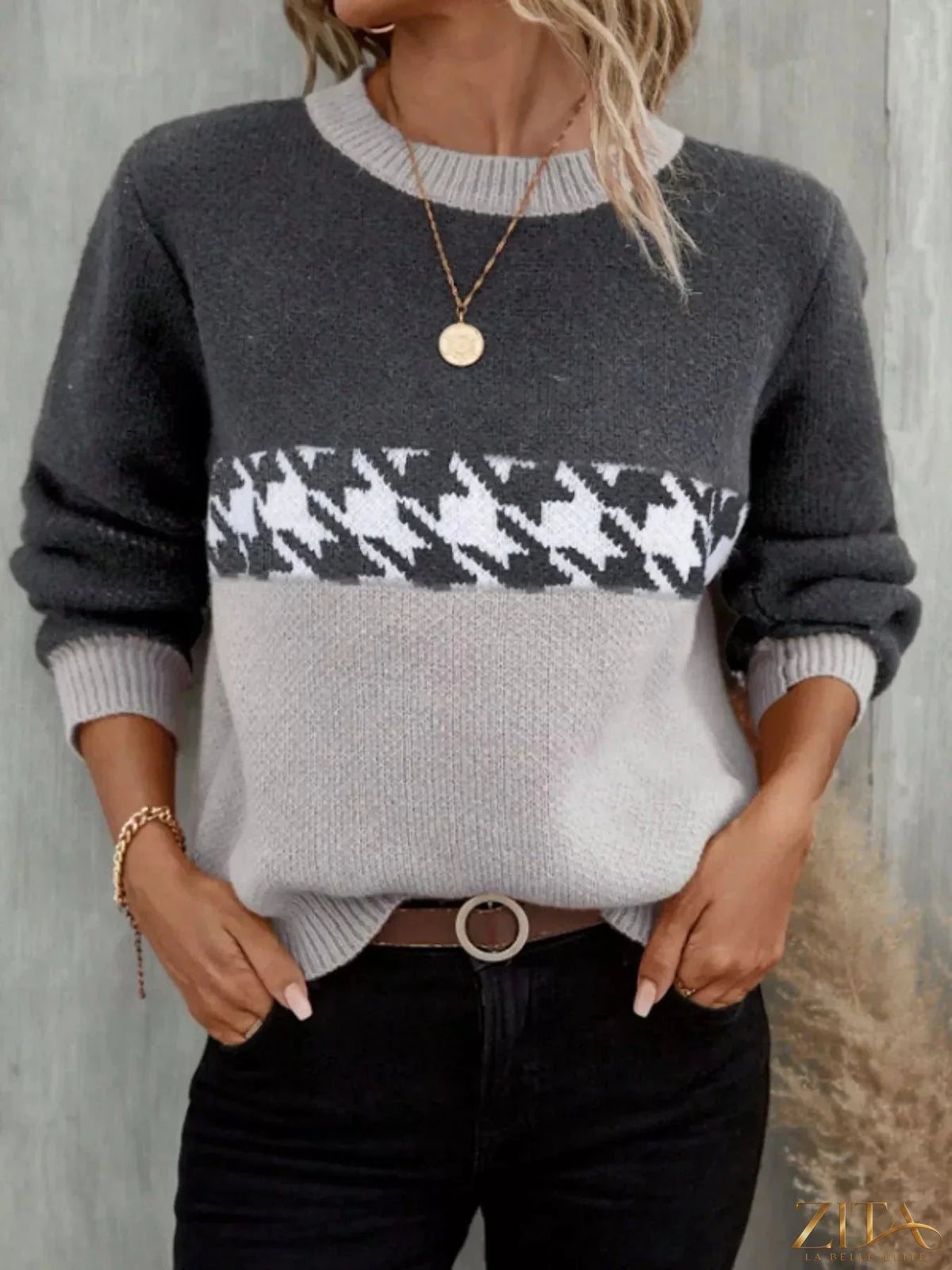 Color block houndstooth sweater from Trendsi featuring a stylish knit design with bold color blocks and a classic pattern.