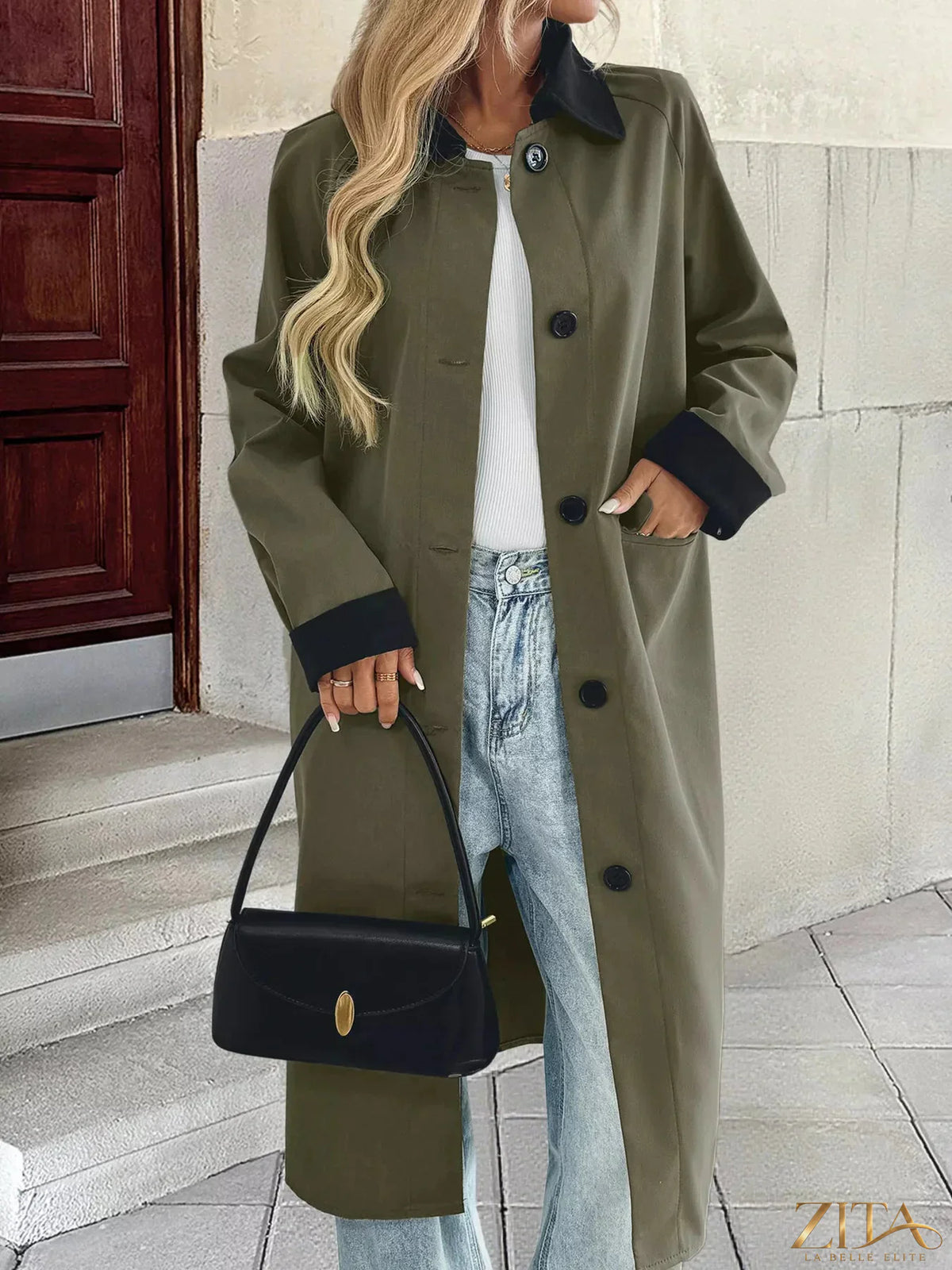 Zita La Belle Elite contrast collar button-up coat showing a stylish navy coat with a white contrast collar and front buttons.