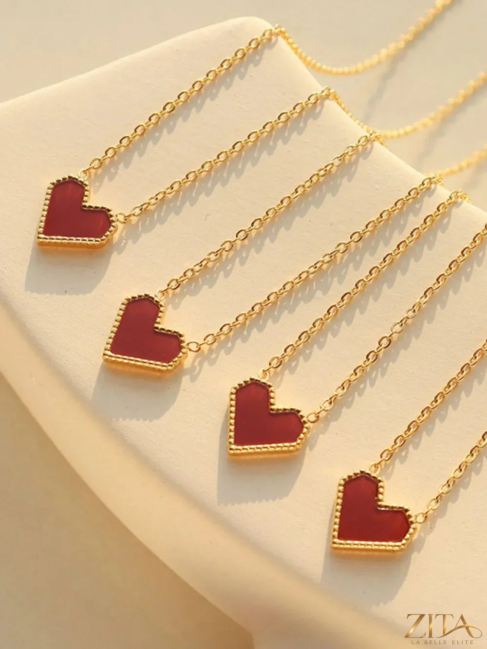 Titanium steel heart-shaped necklace by Zita La Belle Elite, featuring a sleek, modern design on a delicate chain.