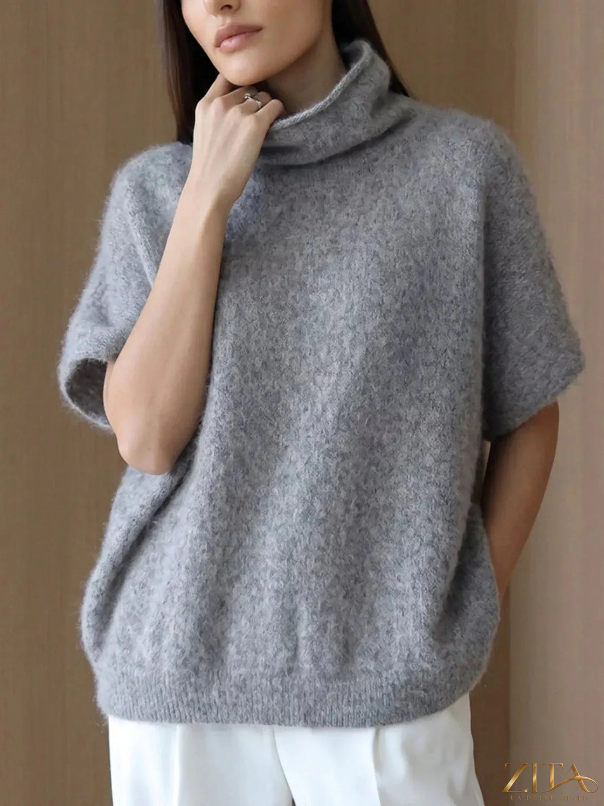Zita La Belle Elite fuzzy short sleeve turtleneck sweater in soft, warm fabric, featuring a cozy, stylish design.