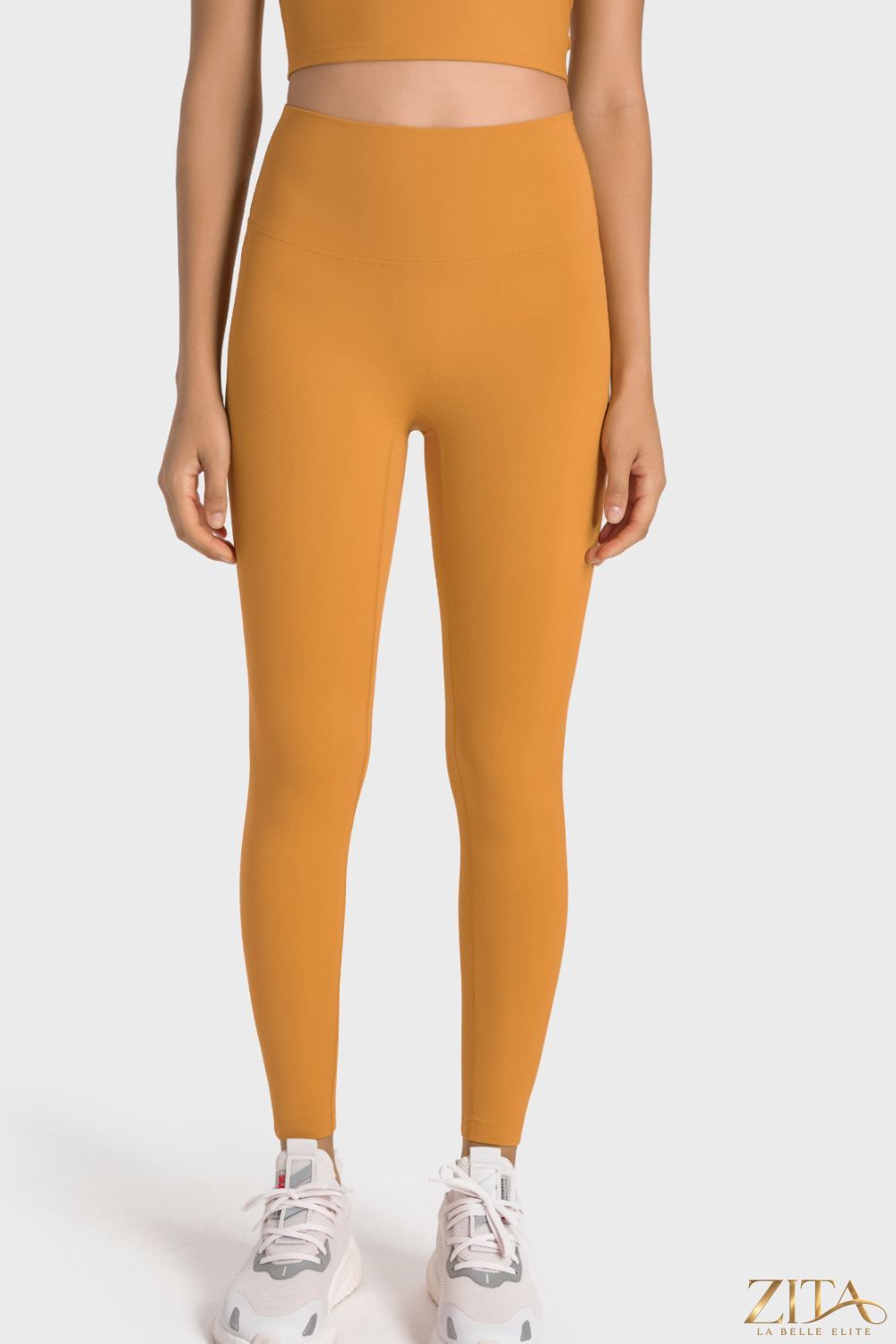 Millennia high-rise wide waistband yoga leggings by Trendsi, featuring a snug fit and comfortable stretch for active wear