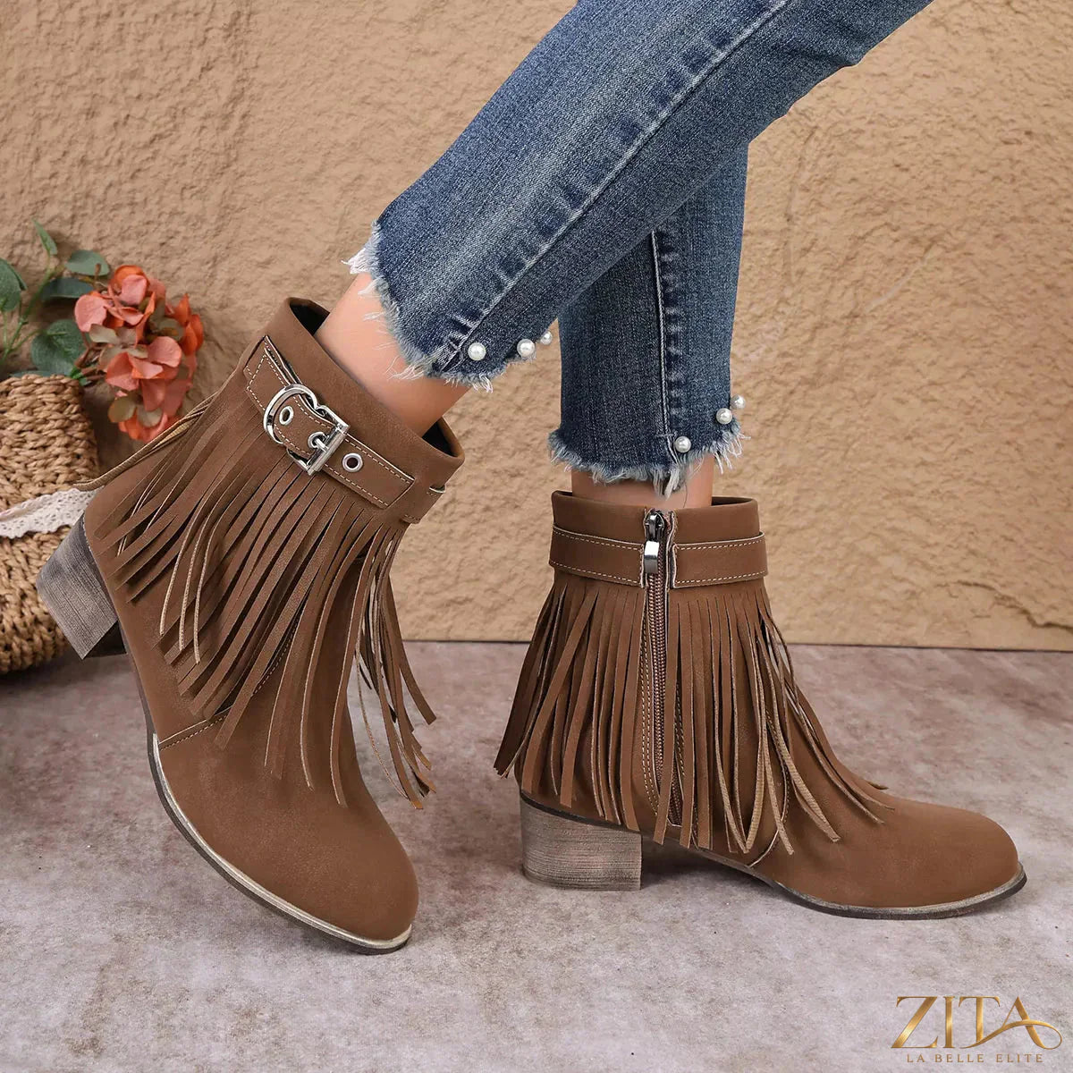 Zita La Belle Elite fringe ankle boots with buckle detail, showcasing stylish leather design and trendy western-inspired accents.