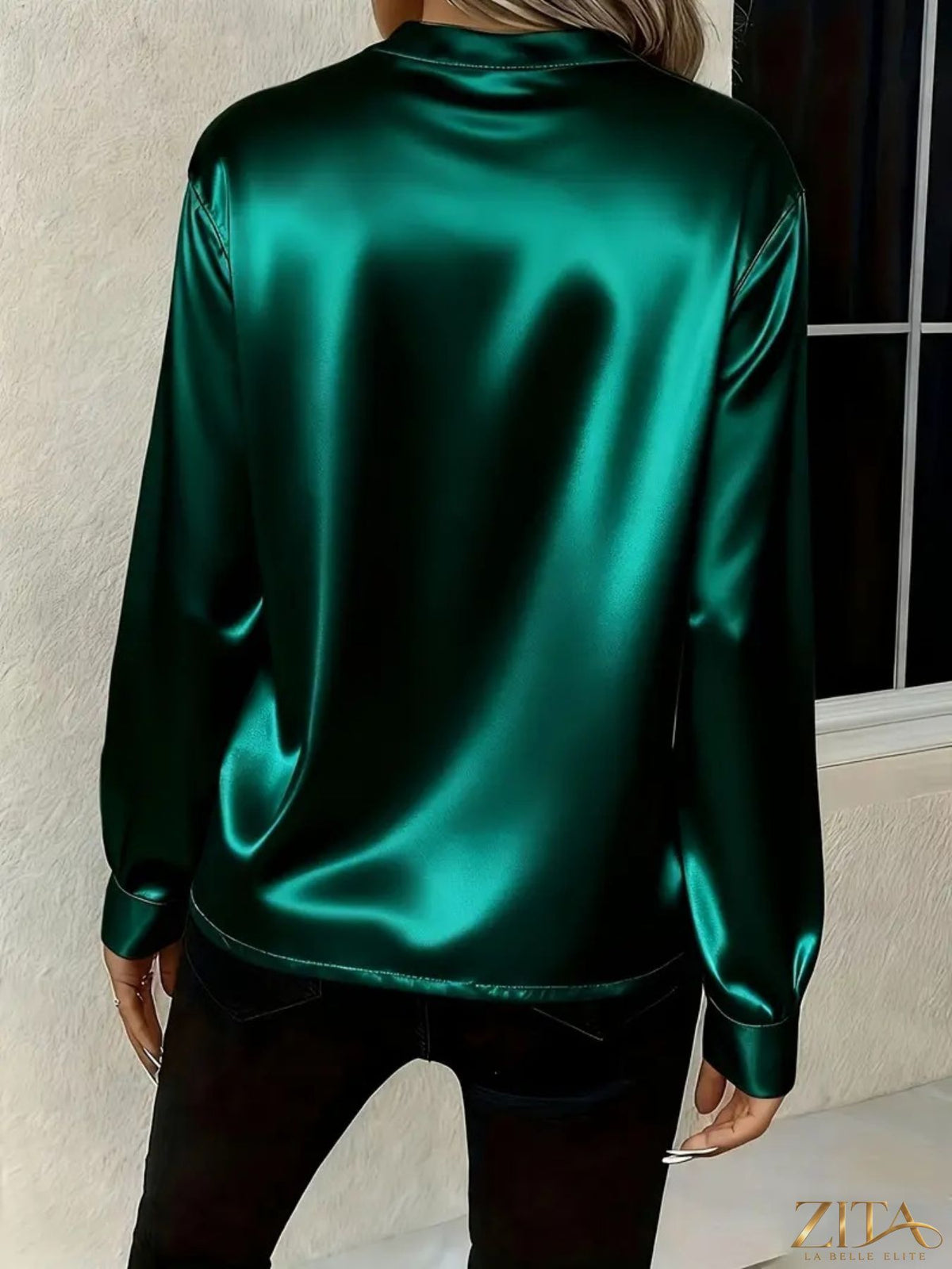 Zita La Belle Elite satin notched long sleeve blouse with a stylish collar and sleek fabric, displayed on a hanger.