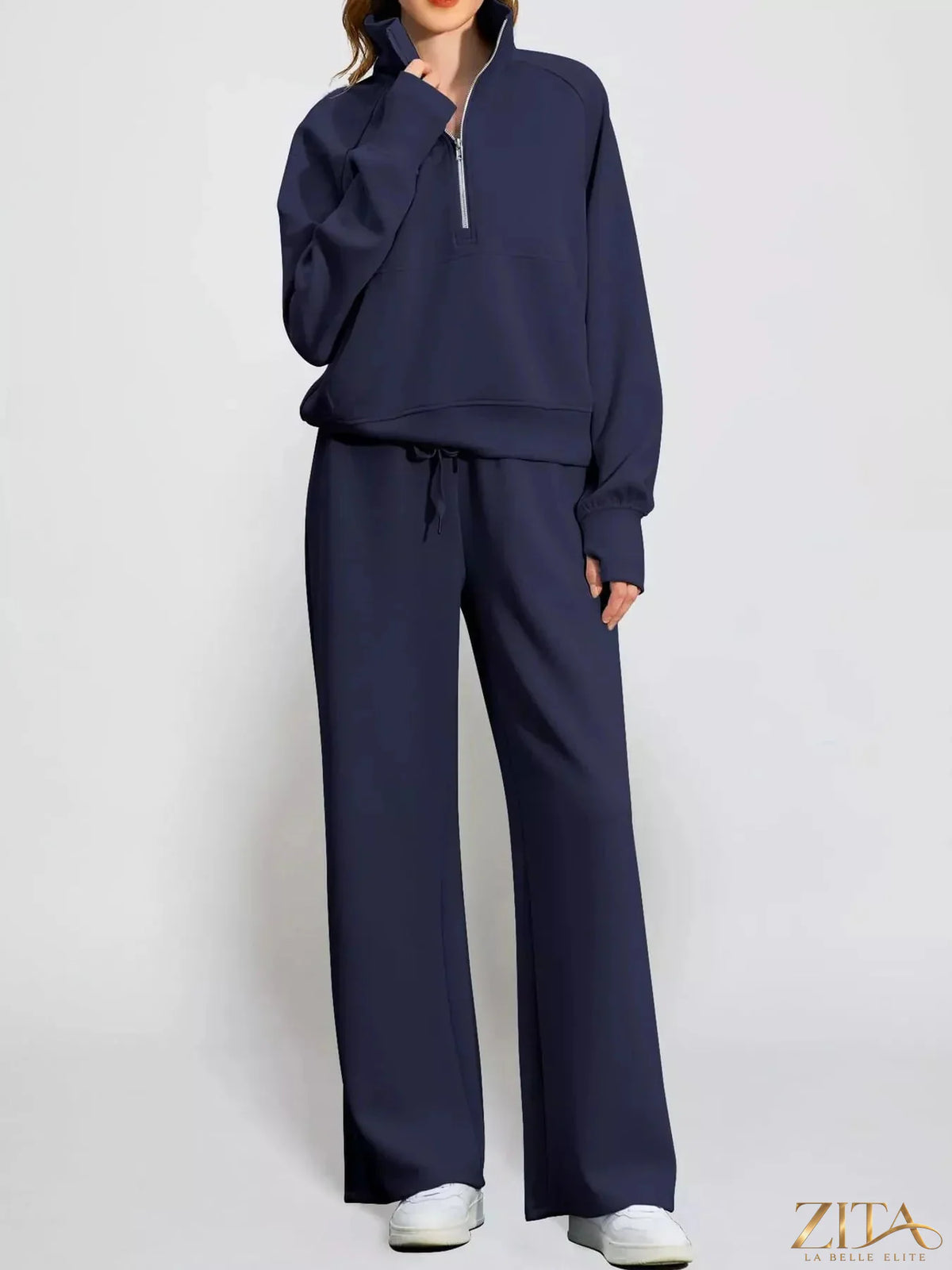 Zita La Belle Elite half-zip sweatshirt and wide-leg pants set in soft fabric, shown in a stylish casual outfit.