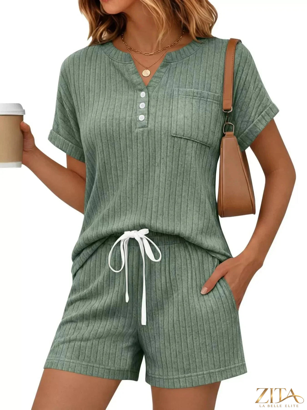 Casual ribbed knit tee and shorts set by Trendsi, featuring a comfortable, relaxed fit in soft fabric, ideal for casual wear.