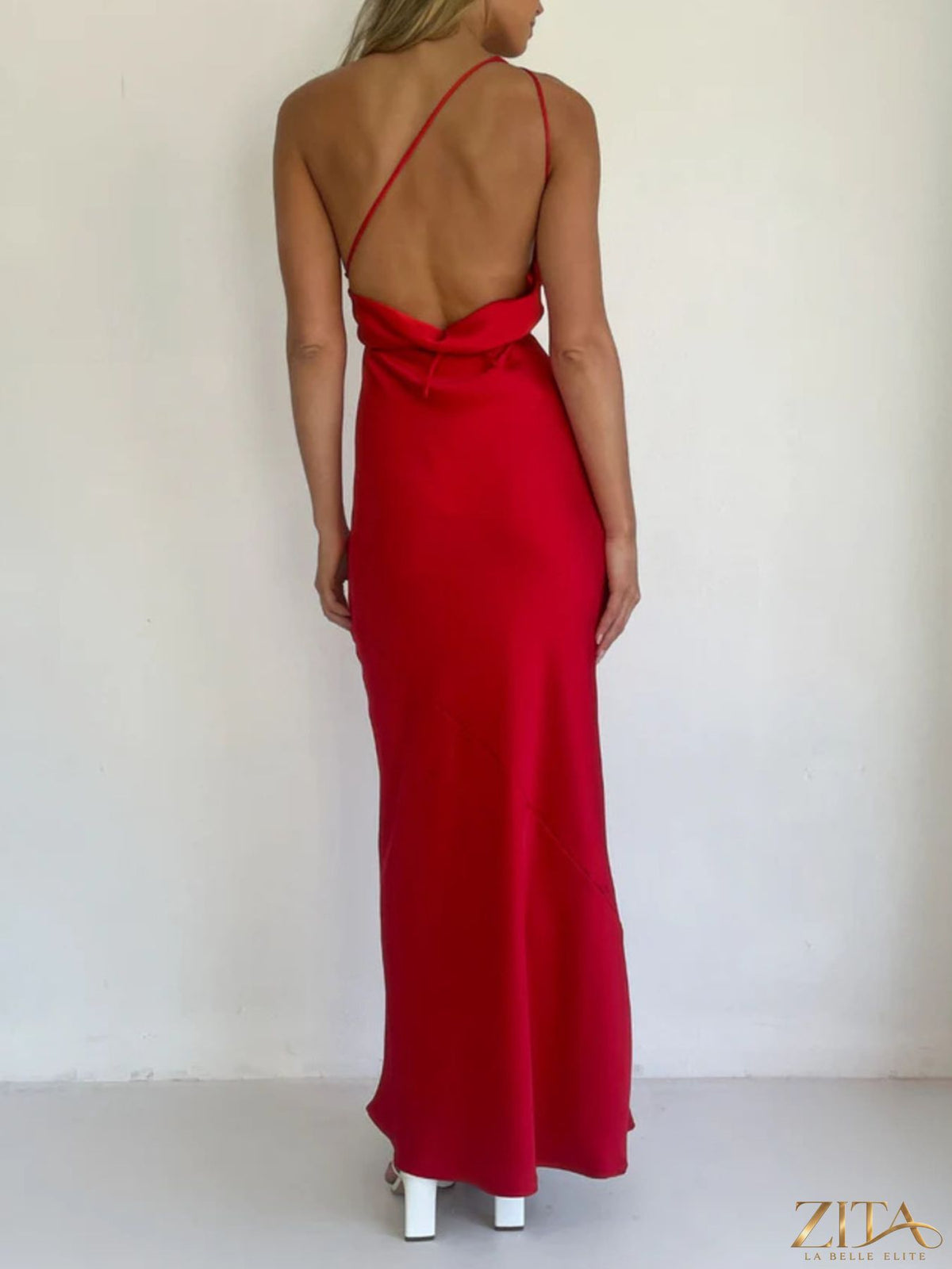 Zita La Belle Elite halter neck satin maxi dress with flowing fabric and elegant design, shown on a model.