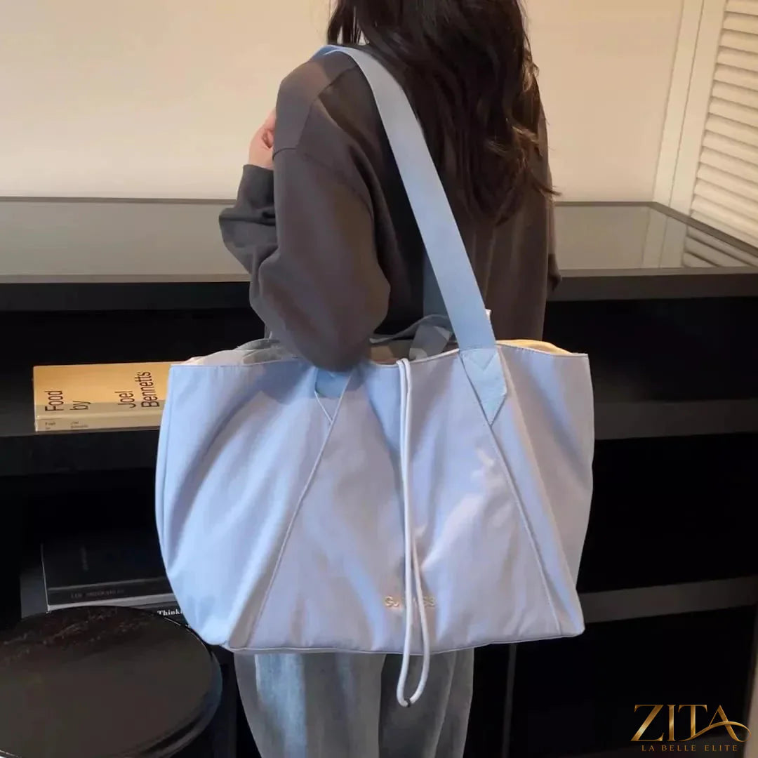 Lightweight Zita La Belle Elite large capacity travel tote bag with multiple compartments and sturdy handles, ideal for travel and daily use.