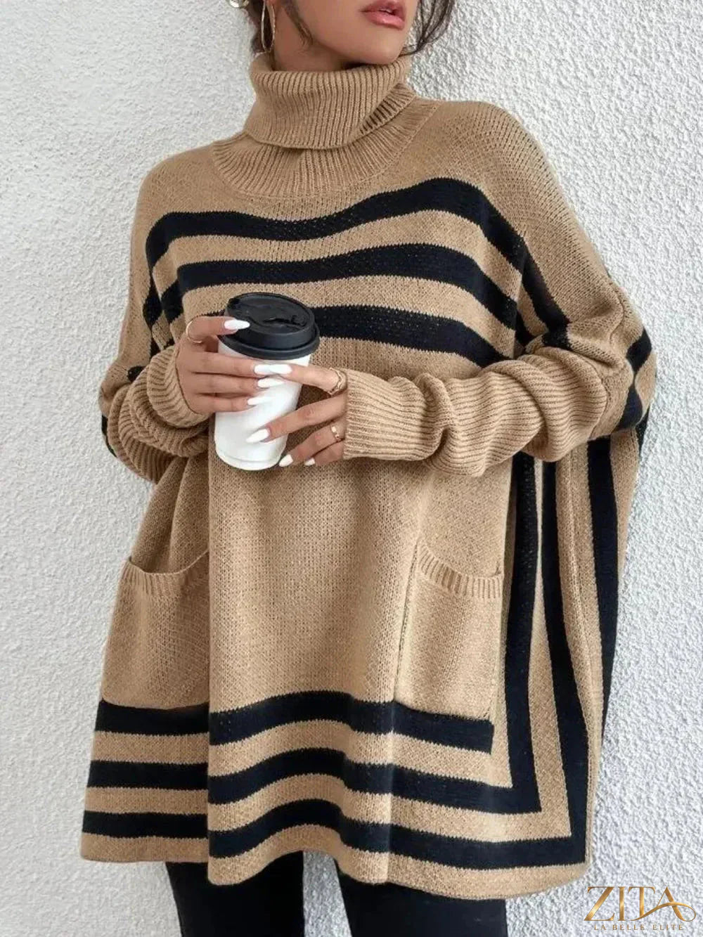 Striped turtleneck batwing sleeve sweater with pockets, featuring bold patterns and cozy knit fabric, from Trendsi.