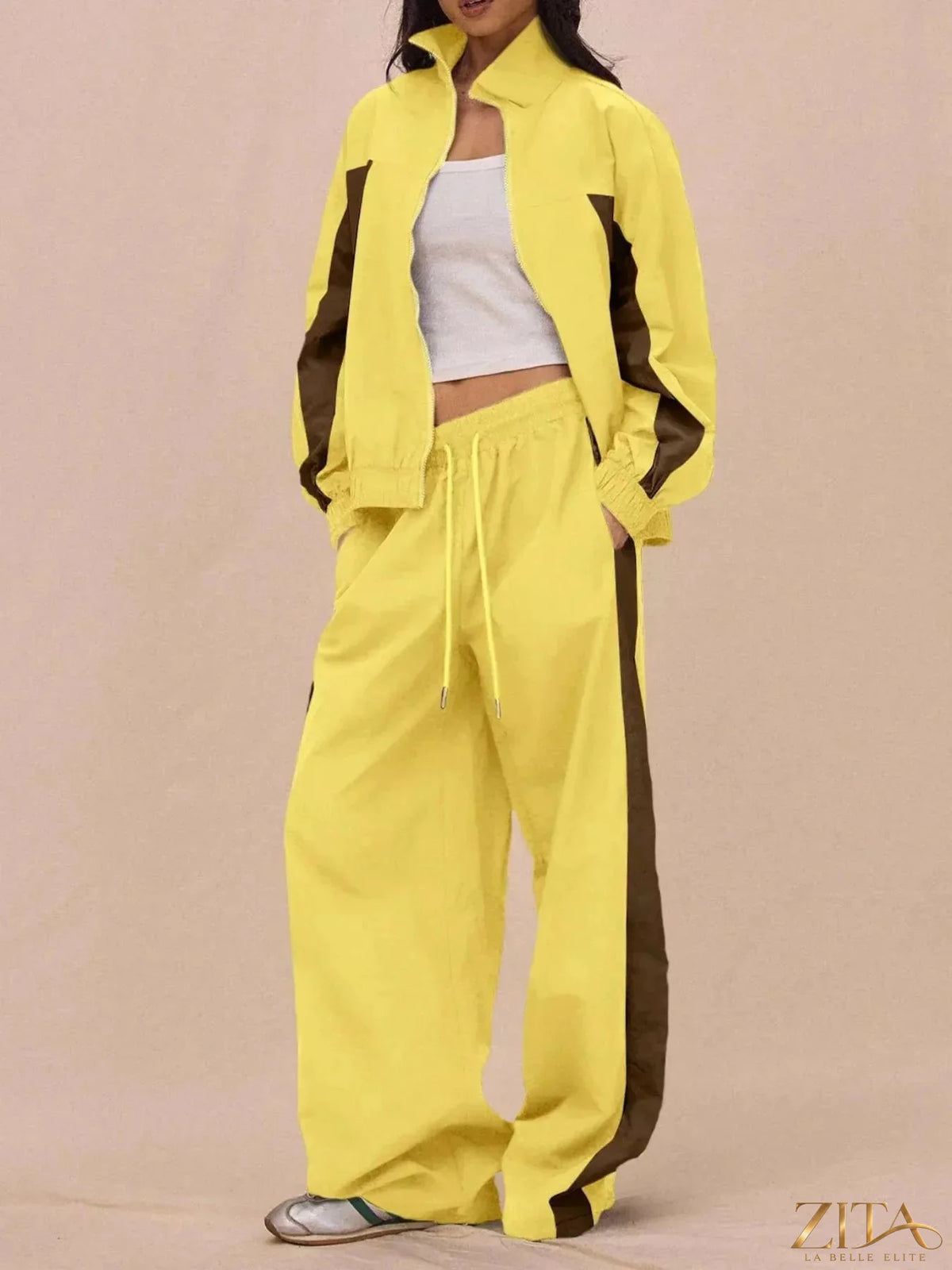Color-block Zita La Belle Elite tracksuit and wide-leg pants set, featuring vibrant panels and comfortable fit.