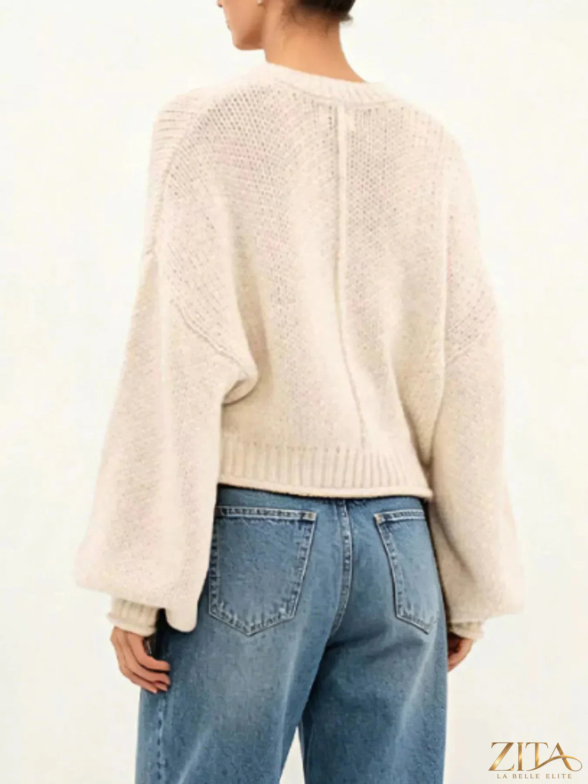 Oversized chunky knit sweater by Trendsi in soft beige, featuring a cozy, thick knit texture and relaxed fit.