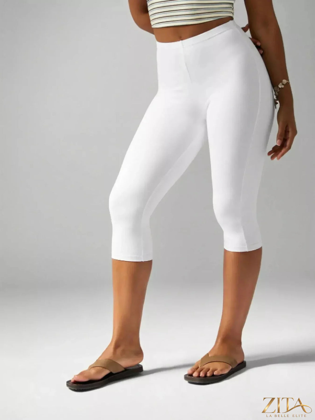 High-waisted Zita La Belle Elite active capri leggings with a sleek fit and stretchy fabric, ideal for workouts and casual wear.