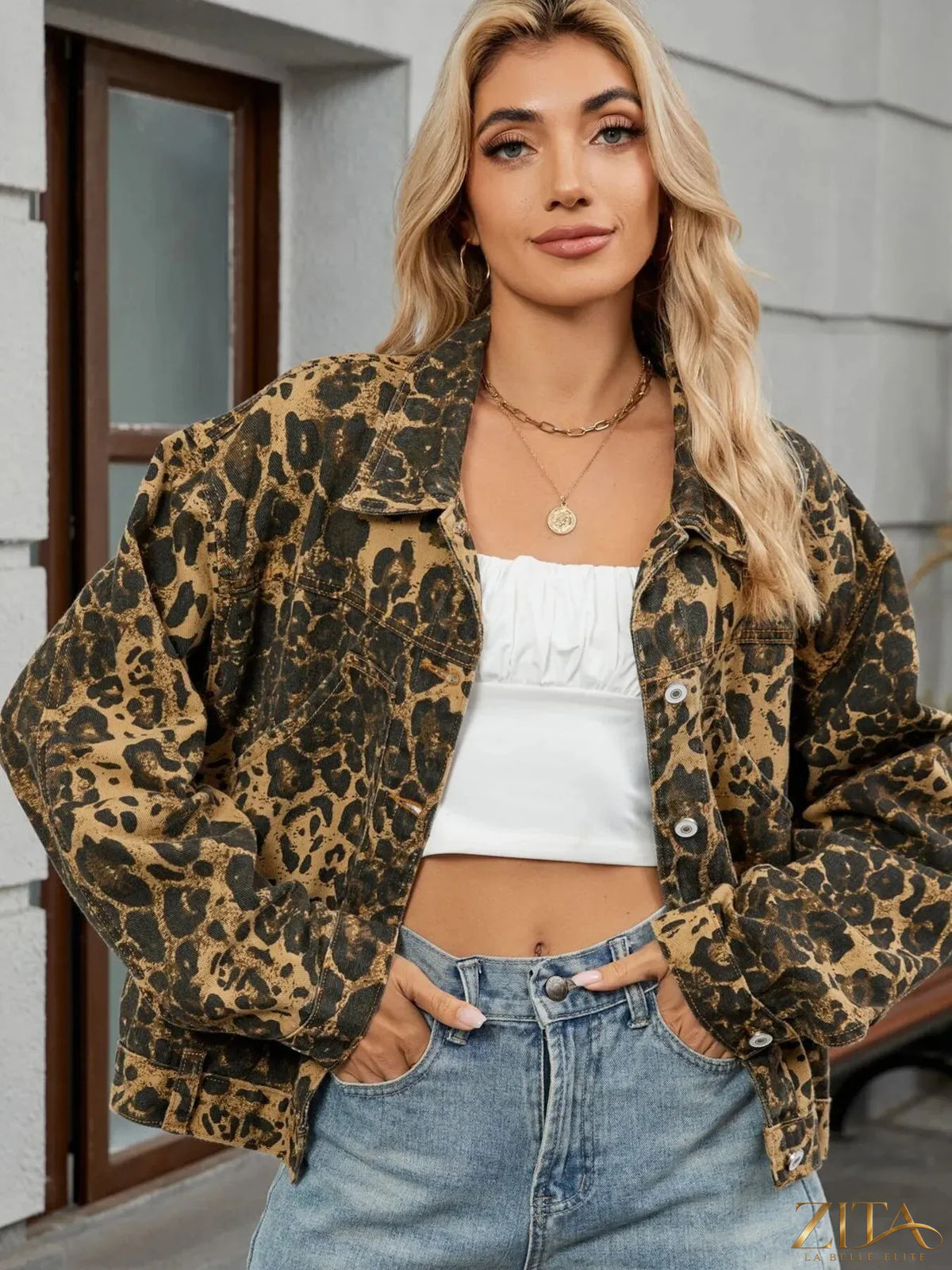 Leopard print button-up denim jacket from Trendsi, featuring classic collar and long sleeves on a casual style.