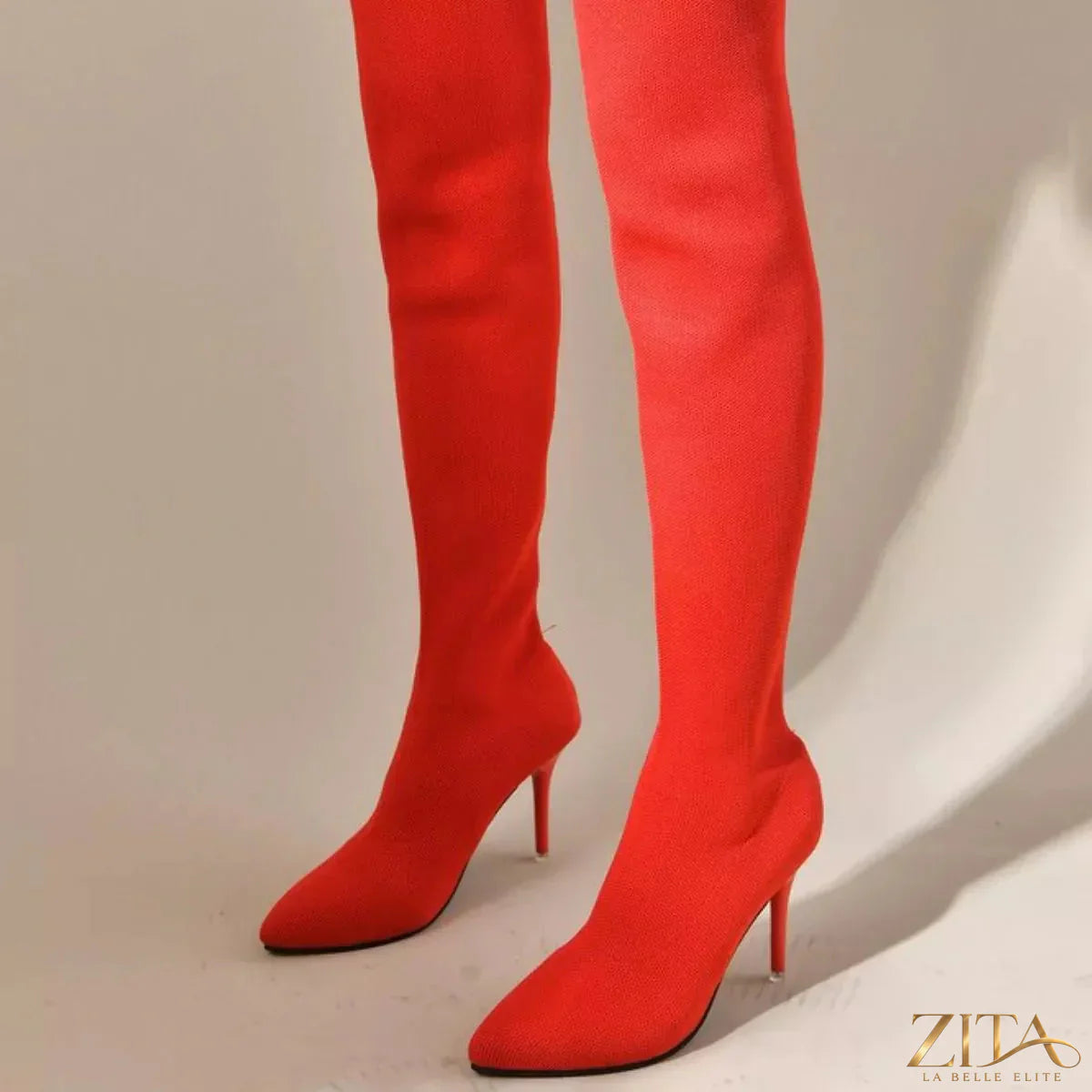 Point toe stiletto boots by Trendsi featuring sleek design, high heels, and a stylish silhouette for fashionable wear.