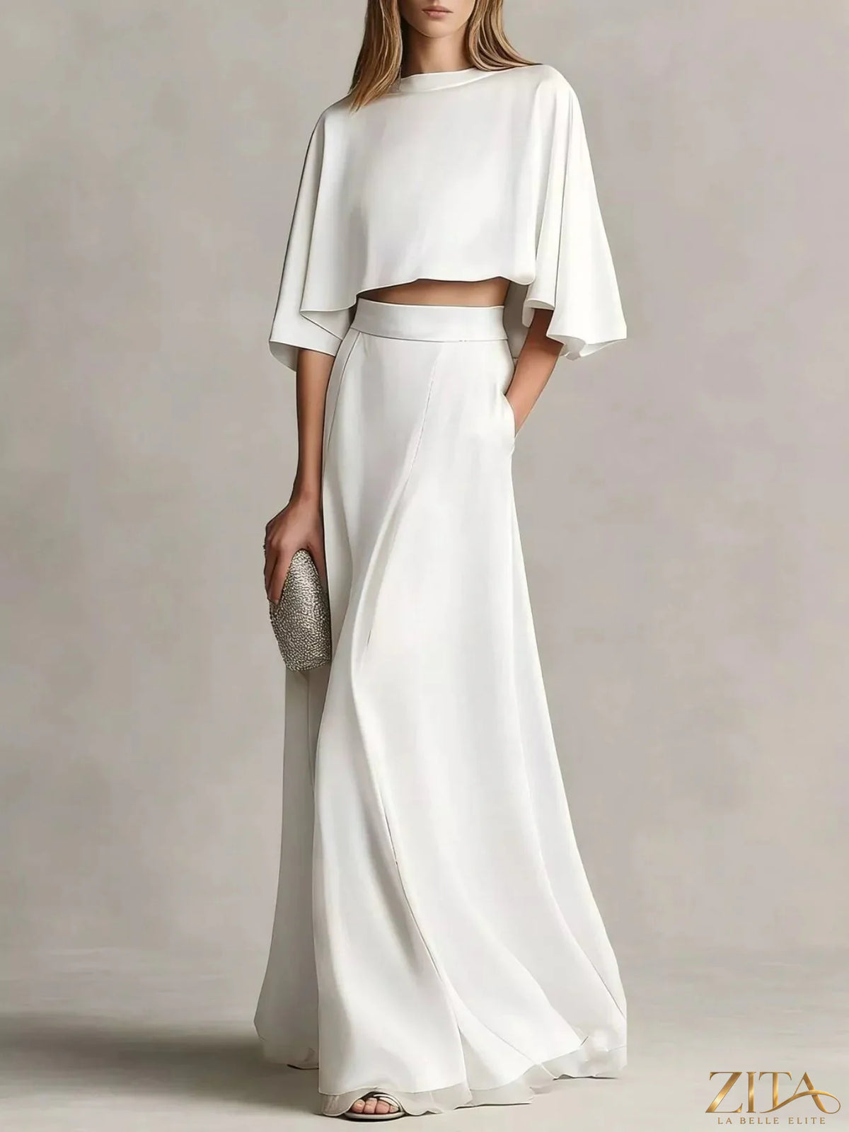 Plus size satin crop top and maxi skirt set by Zita La Belle Elite, featuring a stylish two-piece satin ensemble.