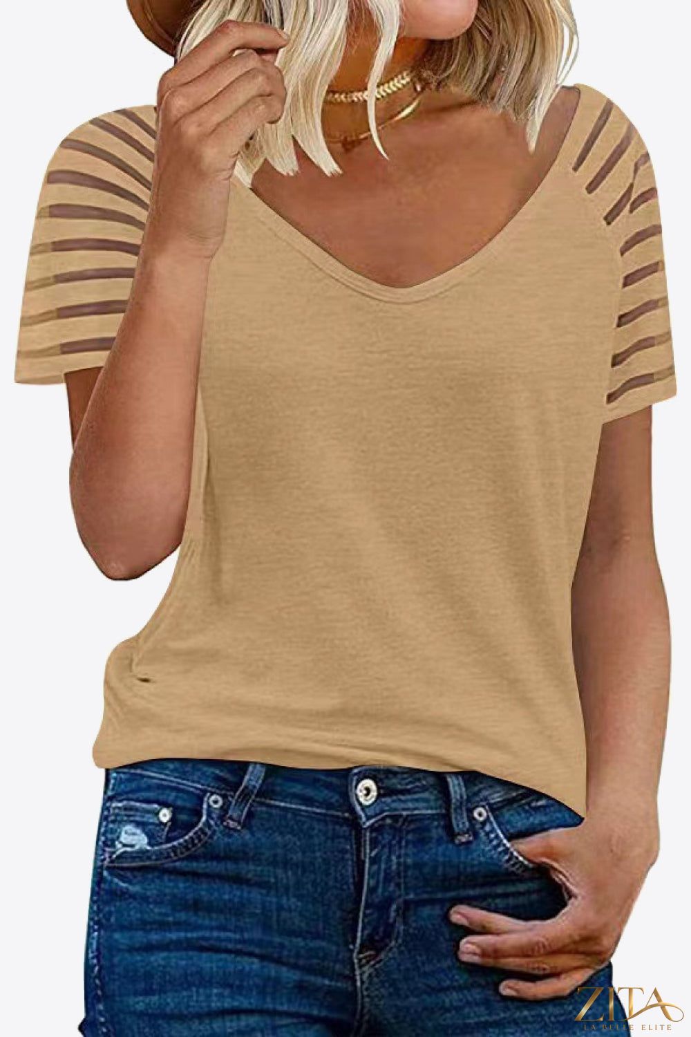 V-Neck Raglan Sleeve Tee by Trendsi, featuring a casual fit with contrasting color sleeves and a soft, comfortable fabric.