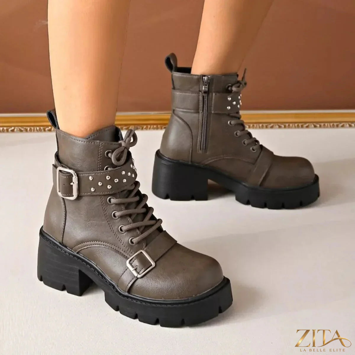 Round toe black block heel boots from Trendsi with a sleek design and sturdy heel, perfect for stylish everyday wear.