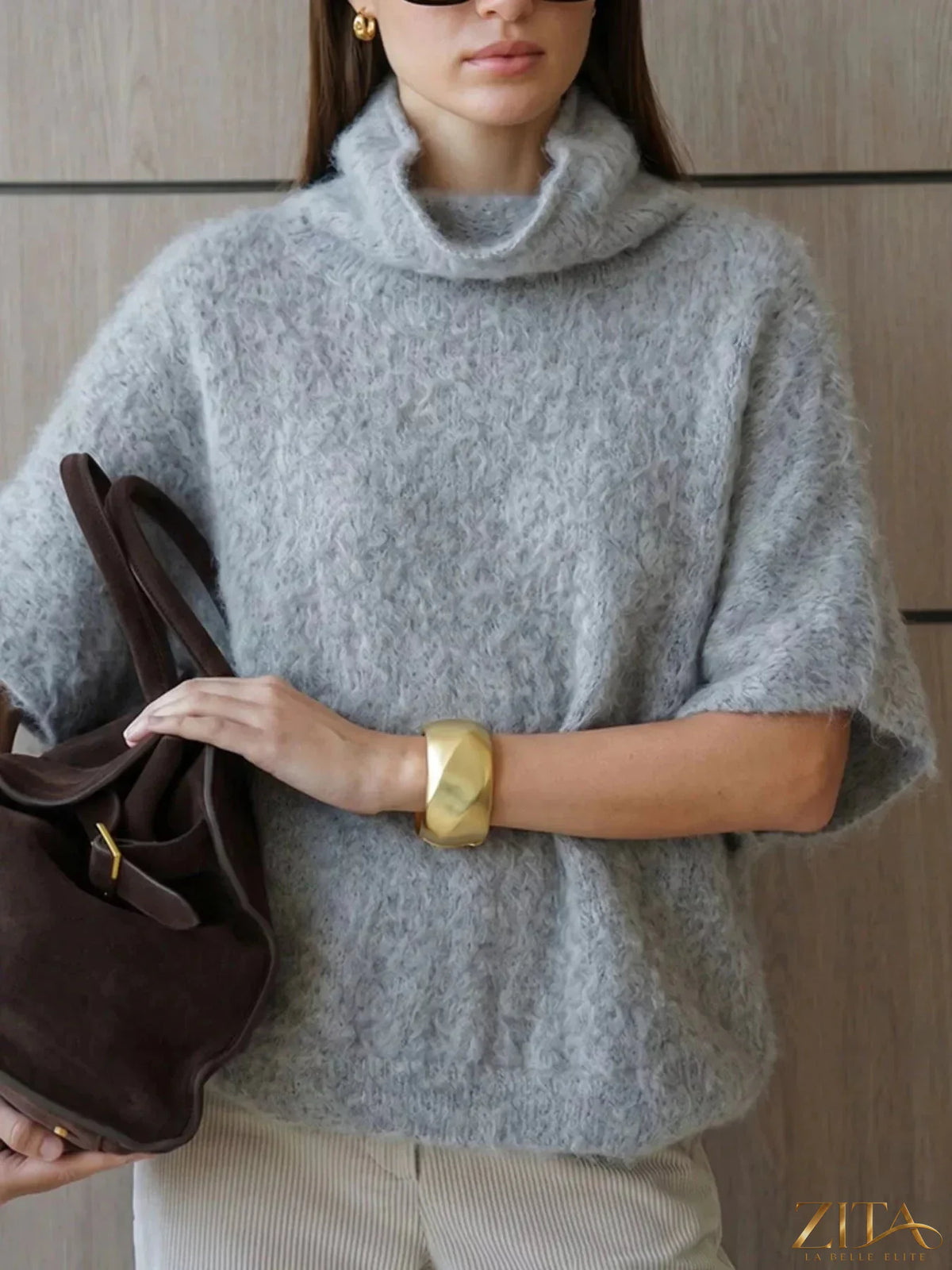 Zita La Belle Elite fuzzy short sleeve turtleneck sweater in cozy, textured fabric, featuring a fitted design and soft appearance.