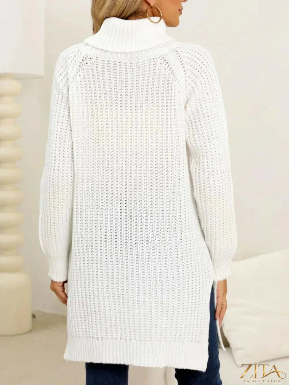 Trendsi slit turtleneck long sleeve sweater in soft knit fabric, featuring a side slit detail and fitted silhouette.