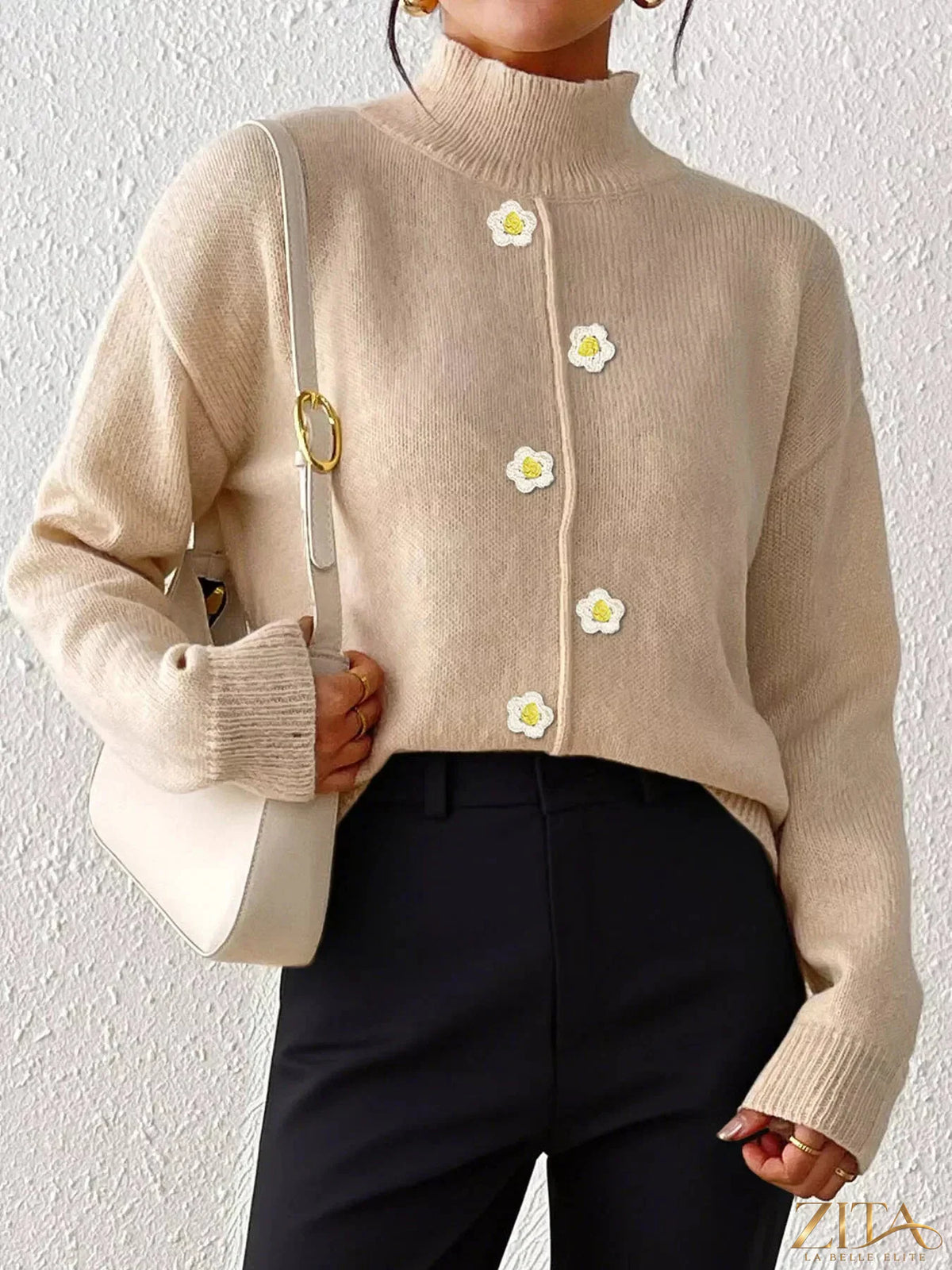 Zita La Belle Elite floral applique turtleneck sweater with colorful embroidered flowers and ribbed cuffs and hem.
