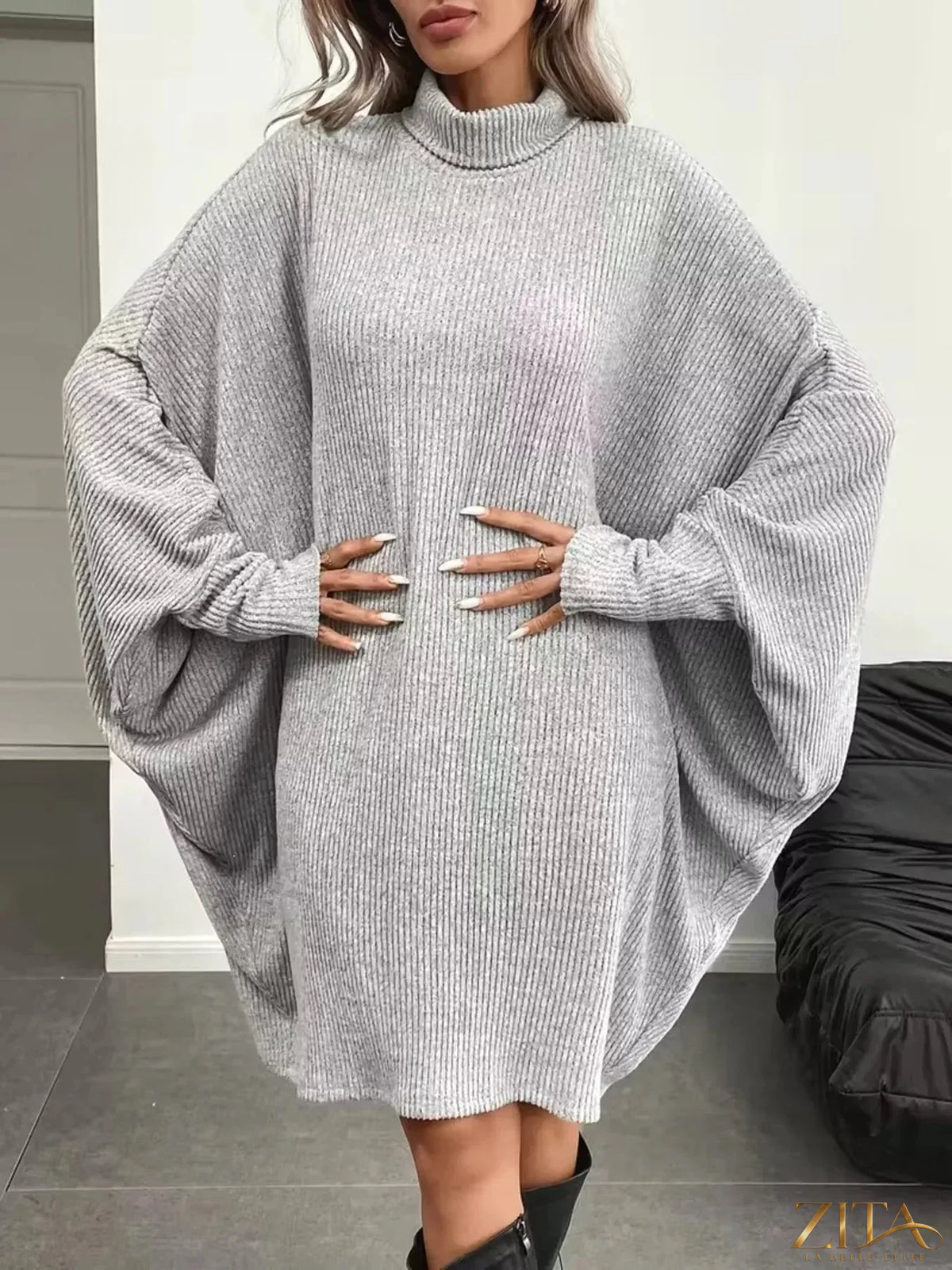 Zita La Belle Elite oversized batwing sleeve ribbed knit turtleneck dress with relaxed fit in black, stylish winter fashion.