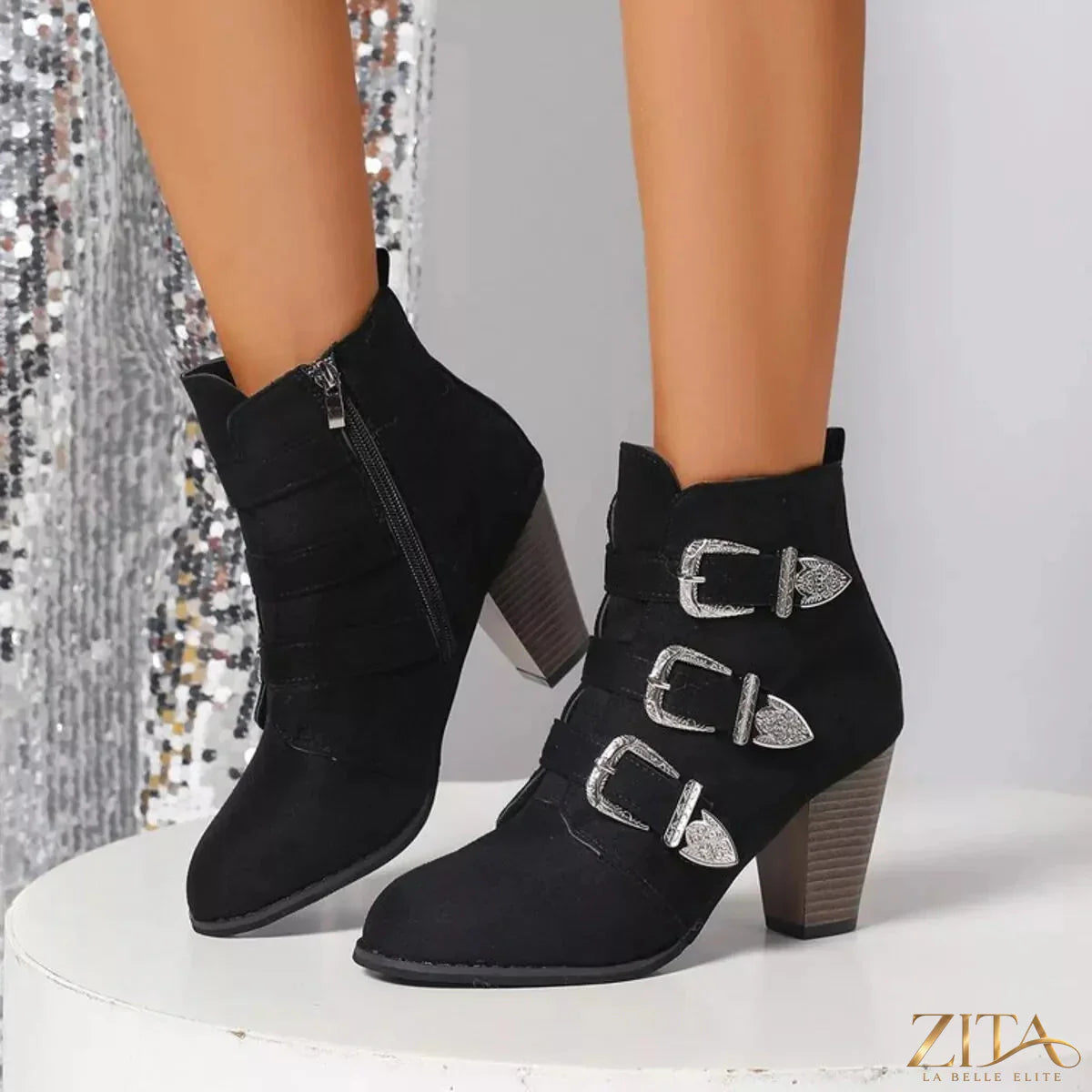 Point toe block heel boots by Trendsi featuring sleek design and stylish silhouette, perfect for fashionable footwear.