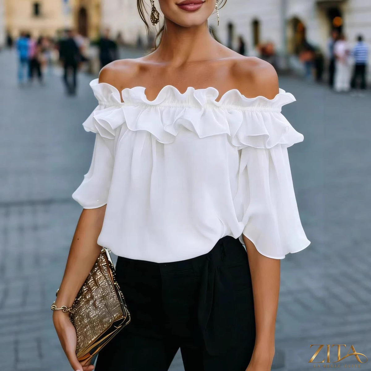 Women's loose-fit minimalist short-sleeve casual shirt by Zita La Belle Elite, shown in a relaxed fit and simple design.