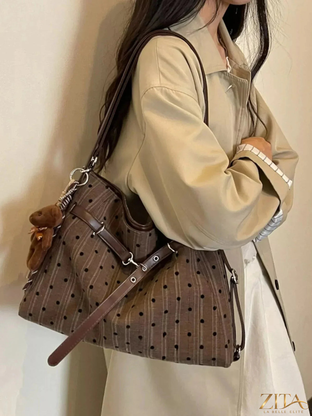Zita La Belle Elite polka dot shoulder bag with black and white pattern, featuring a stylish strap and compact design.