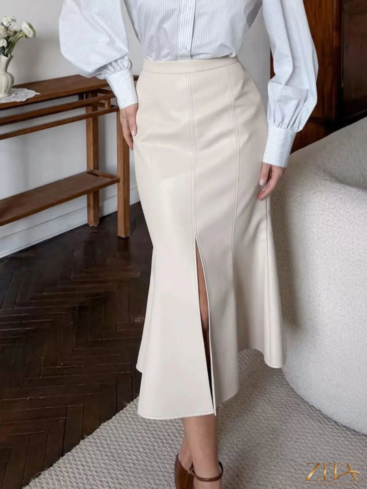 Zita La Belle Elite slit mermaid midi skirt in flowing fabric, featuring a high waist and a dramatic side slit for elegant movement.