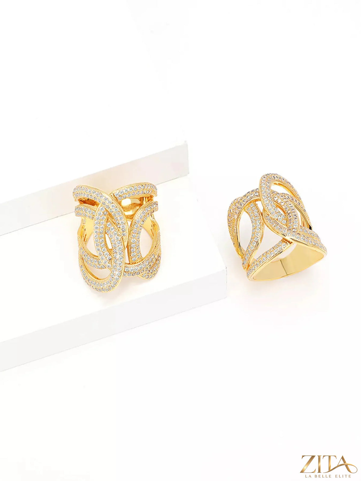 18K gold-plated zircon interwoven ring by Zita La Belle Elite, featuring sparkling zircon stones and a sleek, elegant design.