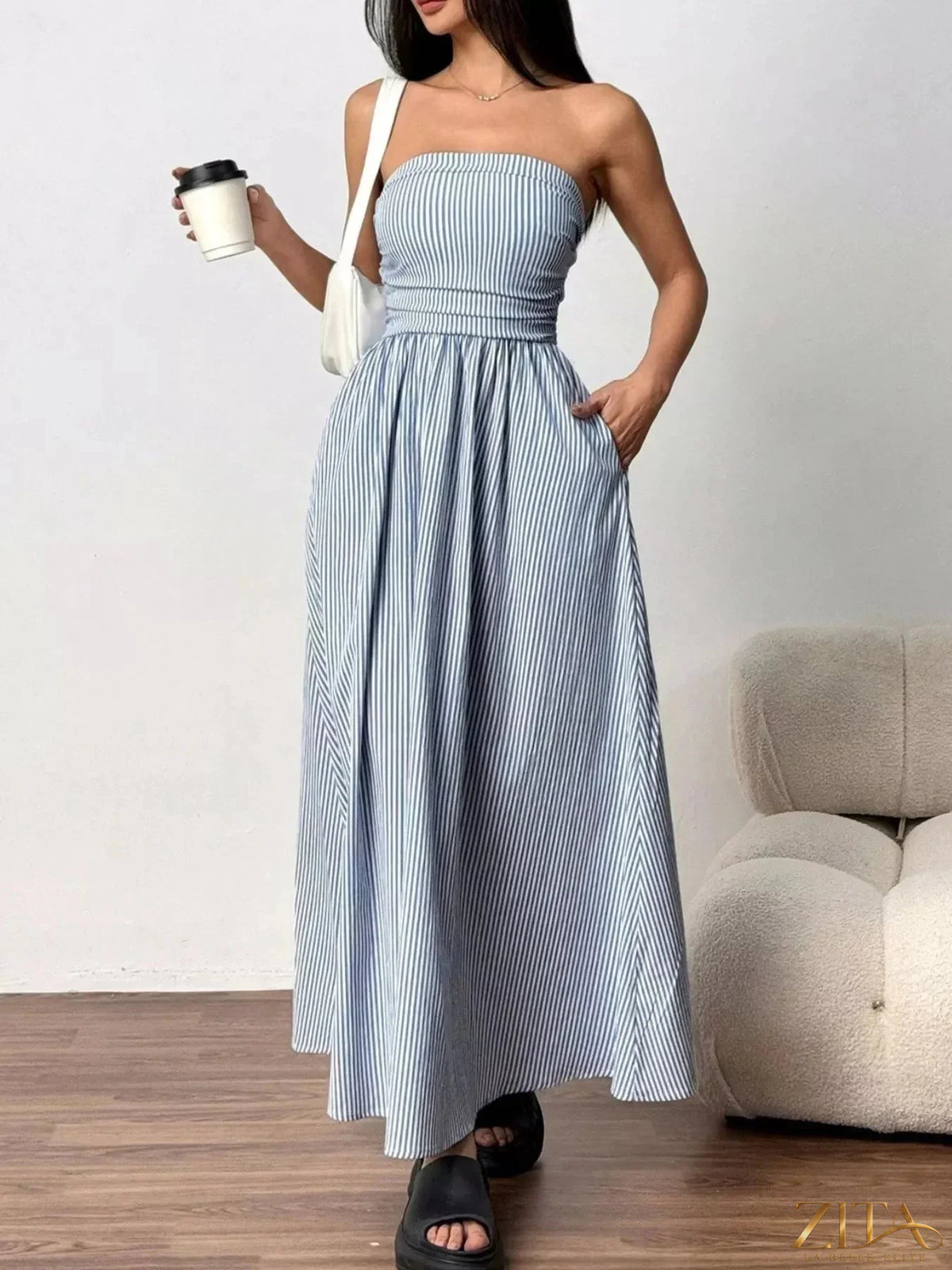 Zita La Belle Elite striped strapless casual maxi dress with a flowing silhouette and vibrant pattern, perfect for warm weather.