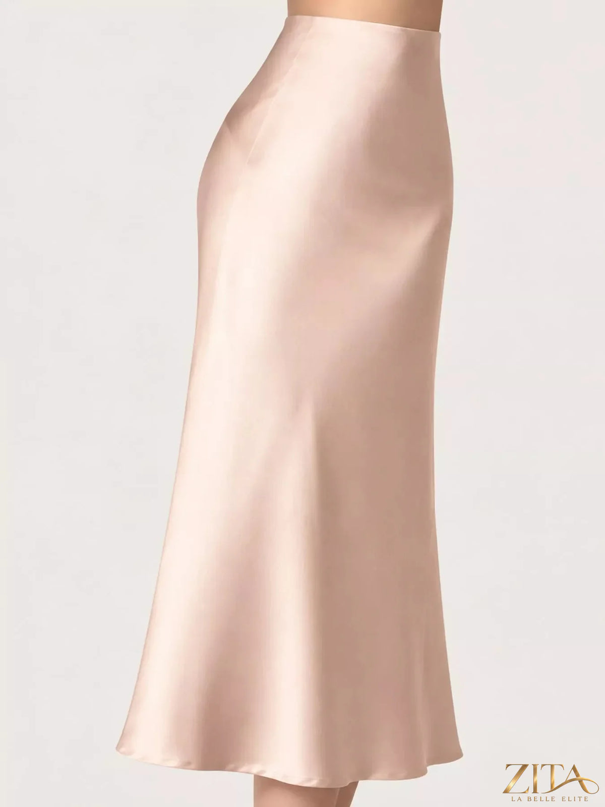 High-waisted satin midi skirt from Trendsi featuring a smooth, shiny fabric and elegant flowy design.