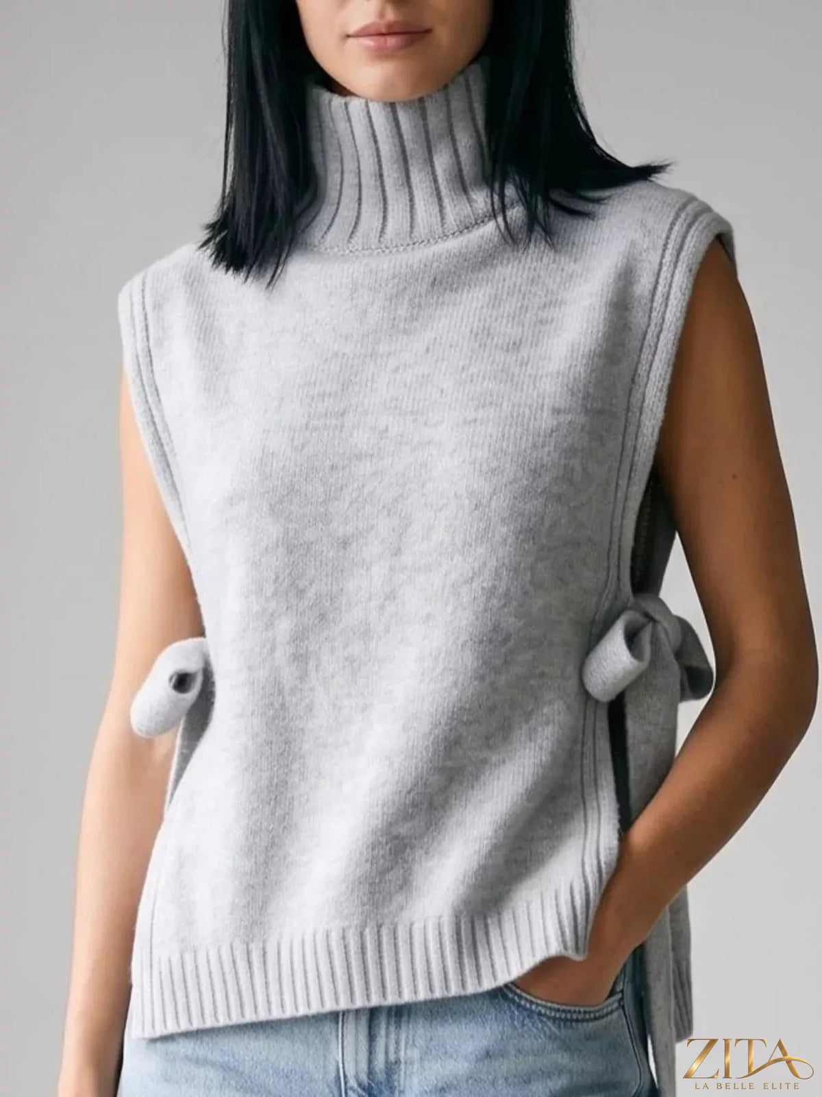 Navy blue turtleneck side-tie knit sweater vest by Trendsi, featuring a cozy ribbed knit design and side tie detail.
