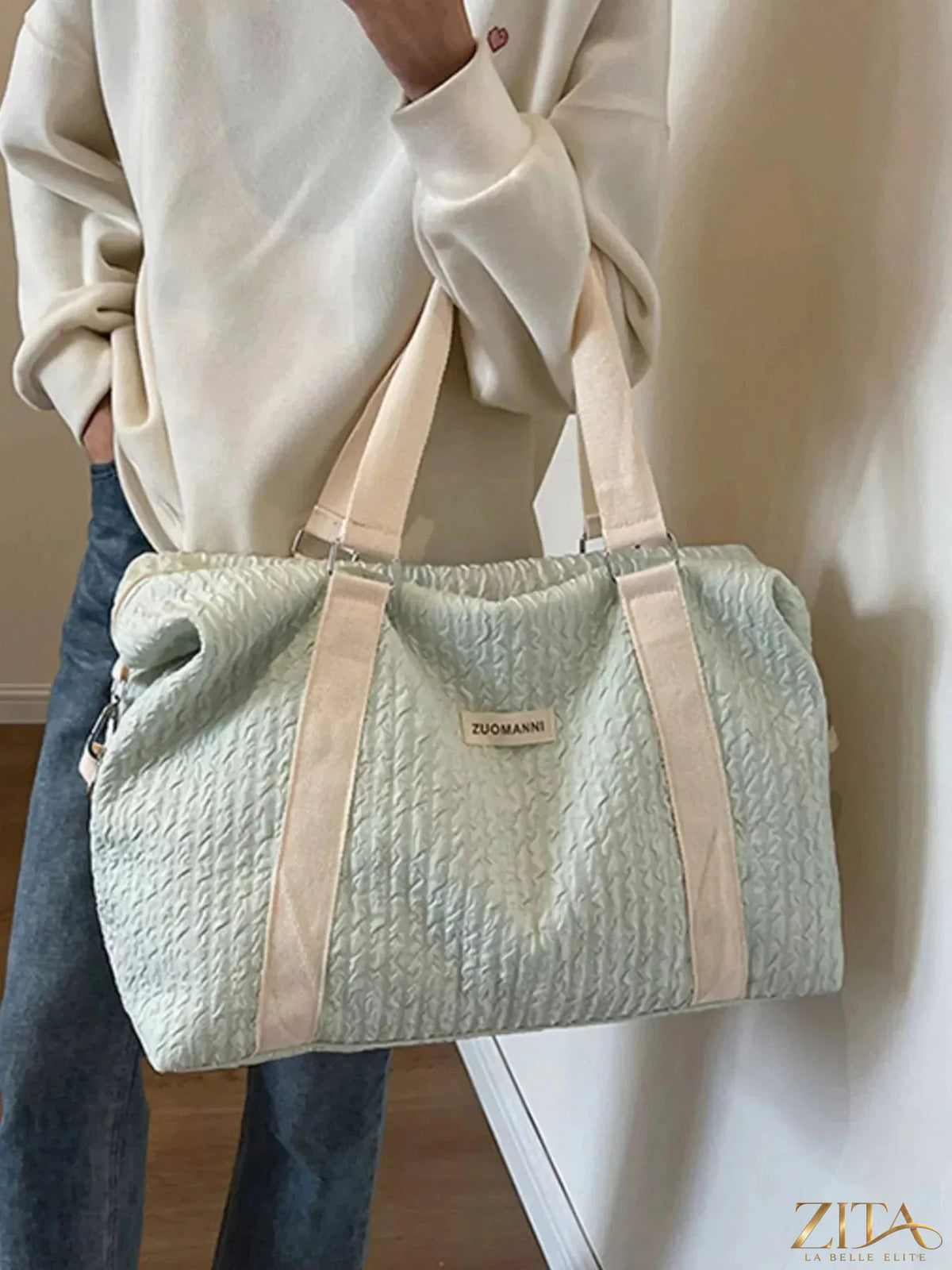 Zita La Belle Elite Texture Travel Bag with adjustable strap, featuring a stylish textured surface and compact design for travel.