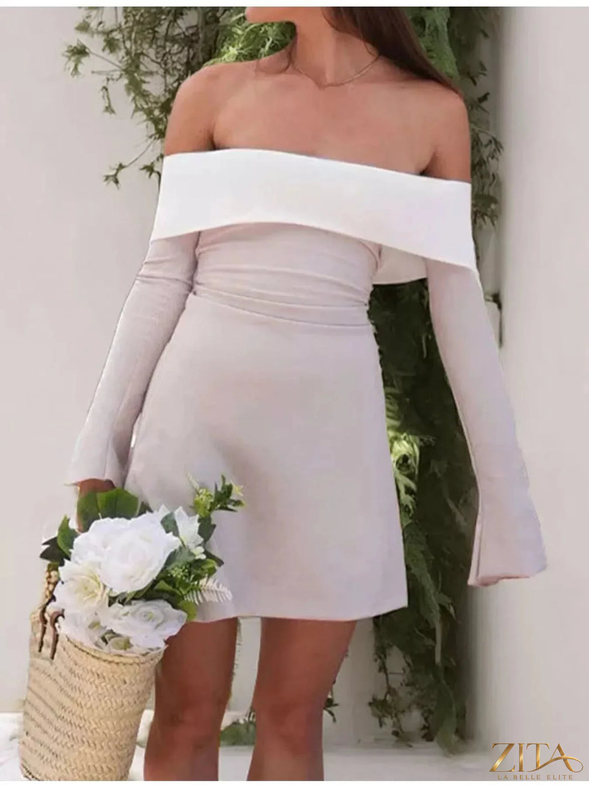 Zita La Belle Elite off-shoulder flare sleeve mini dress in soft fabric, featuring a fitted bodice and flowing skirt.