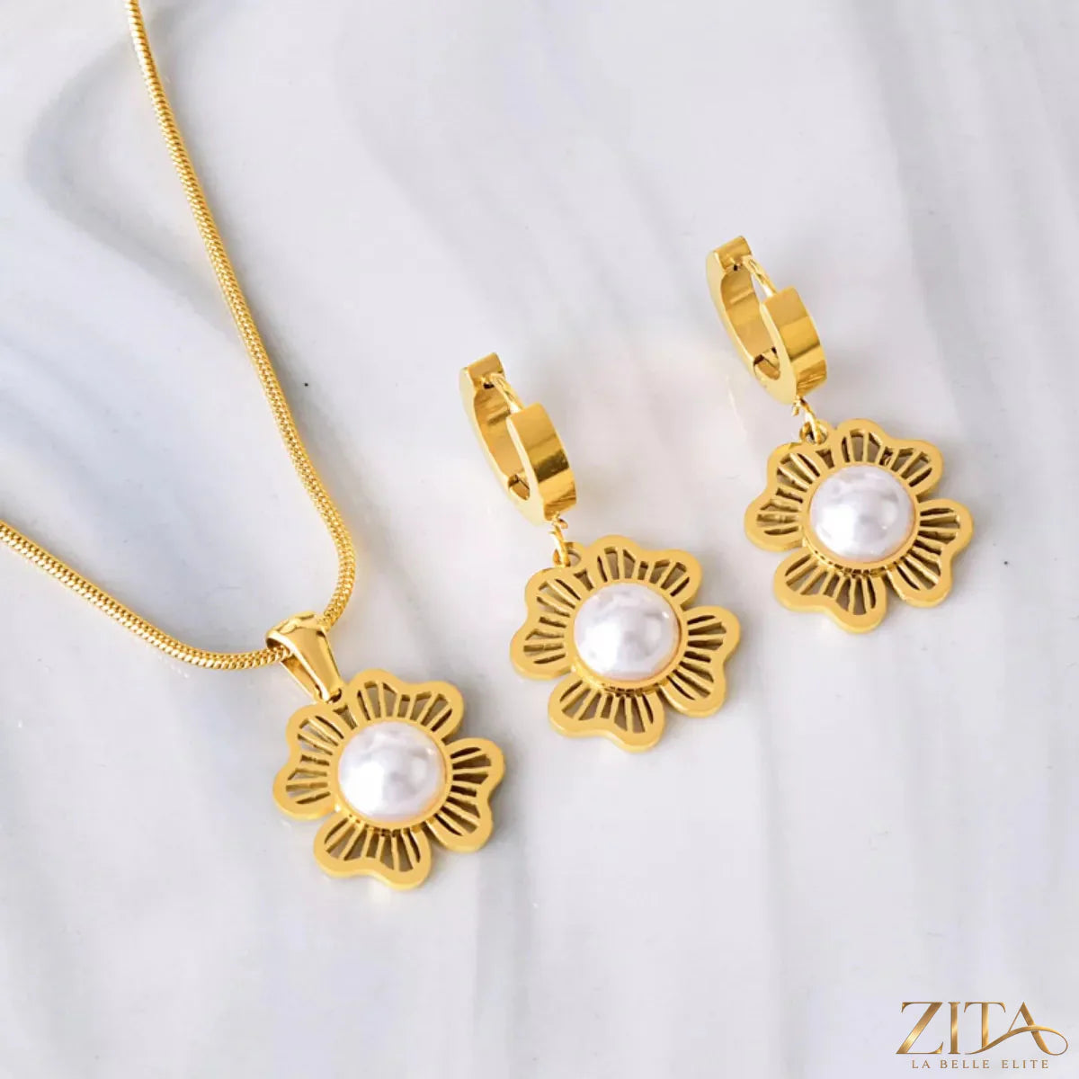 18K gold-plated flower jewelry set featuring earrings and necklace with intricate floral designs, elegant and feminine style.