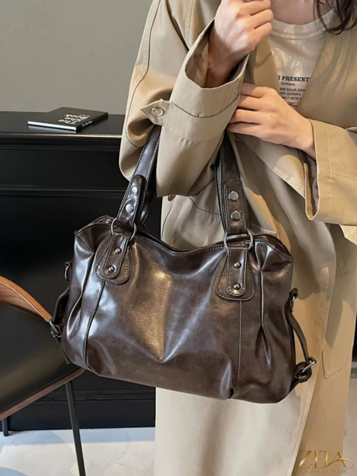 Vintage style leather handbag by Trendsi, featuring a classic design with sturdy leather and elegant details.