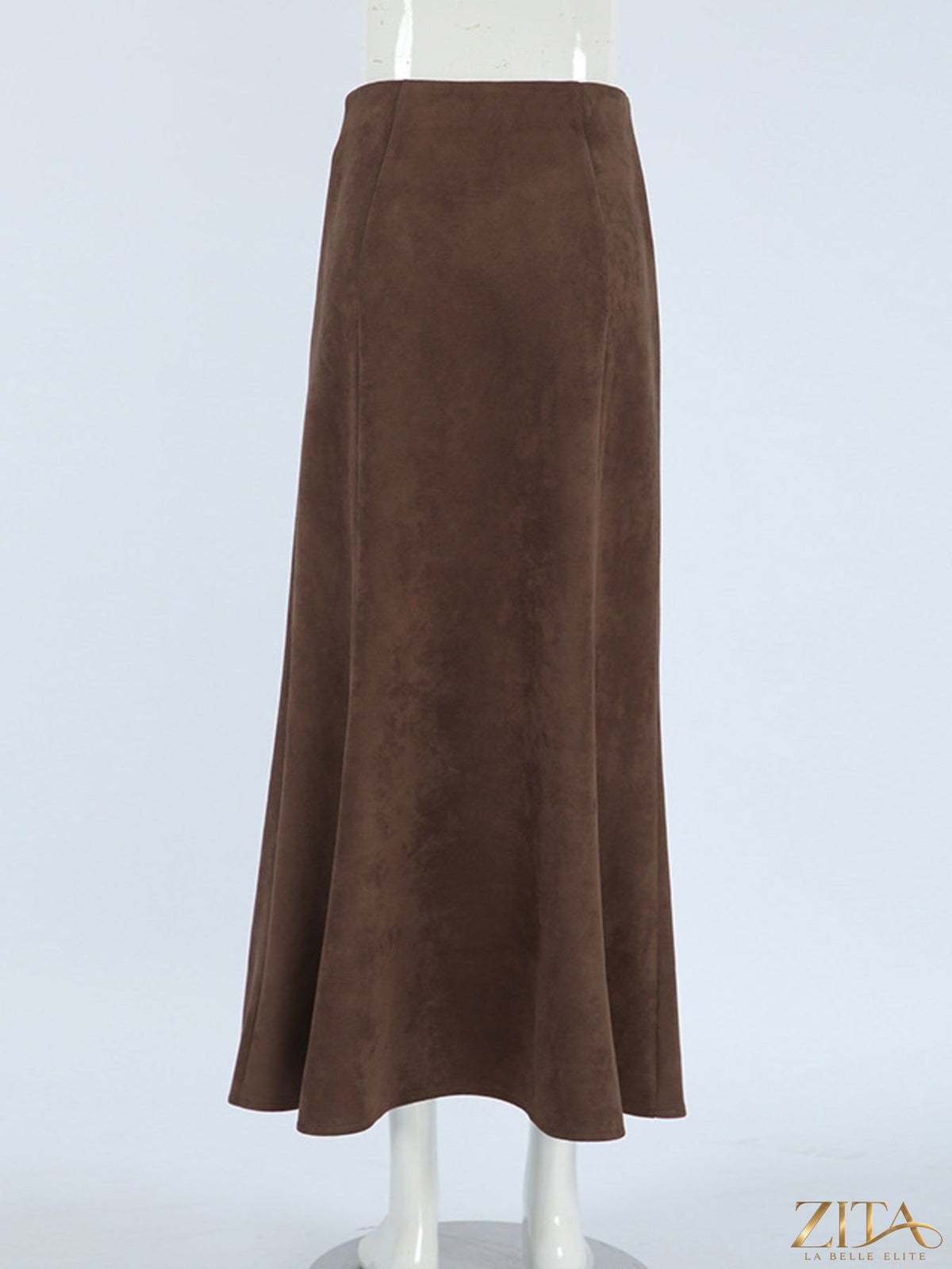 Brown suede midi skirt from Trendsi featuring a high waist and flowing silhouette, styled on a model.