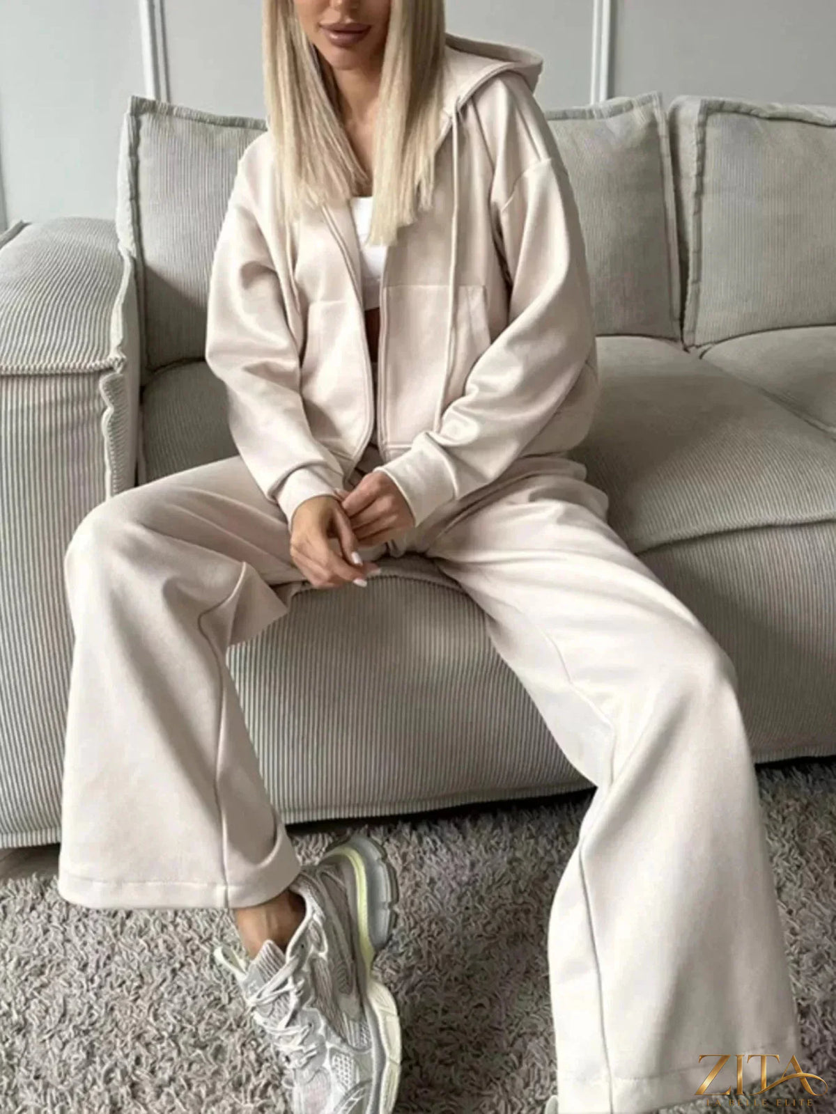 Zita La Belle Elite zip-up hoodie and wide-leg pants set, black casual loungewear outfit displayed on a model.
