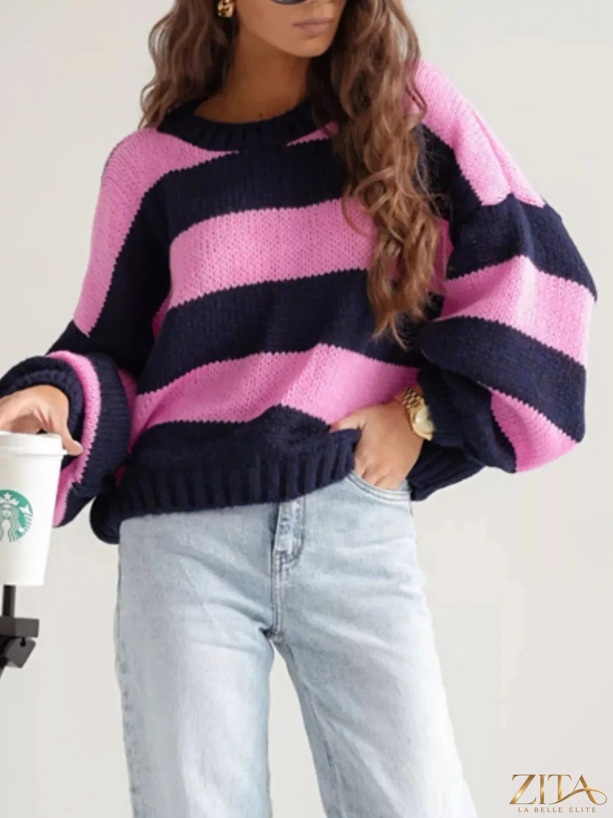 Striped dropped shoulder sweater by Trendsi, featuring a cozy knit with bold horizontal stripes and relaxed fit.