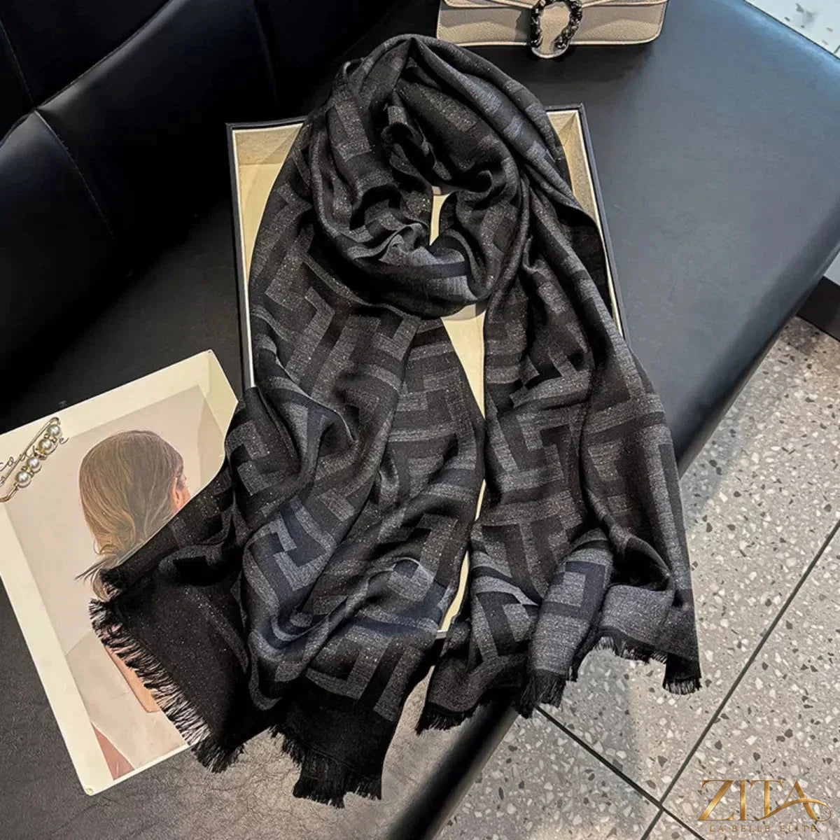 Raw hem scarf by Trendsi featuring soft fabric and fringed edges, styled draped for a casual, trendy look.