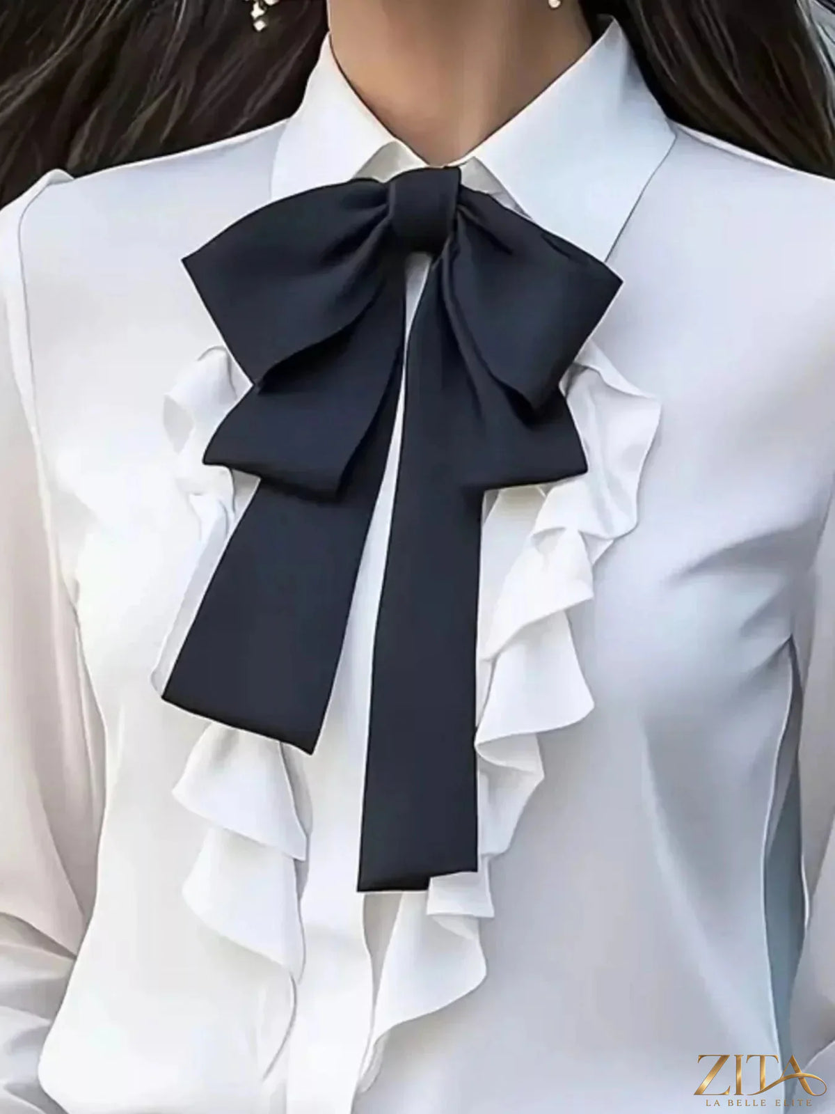 Zita La Belle Elite ruffled tie-front long sleeve blouse with feminine details and elegant design, shown on a model.