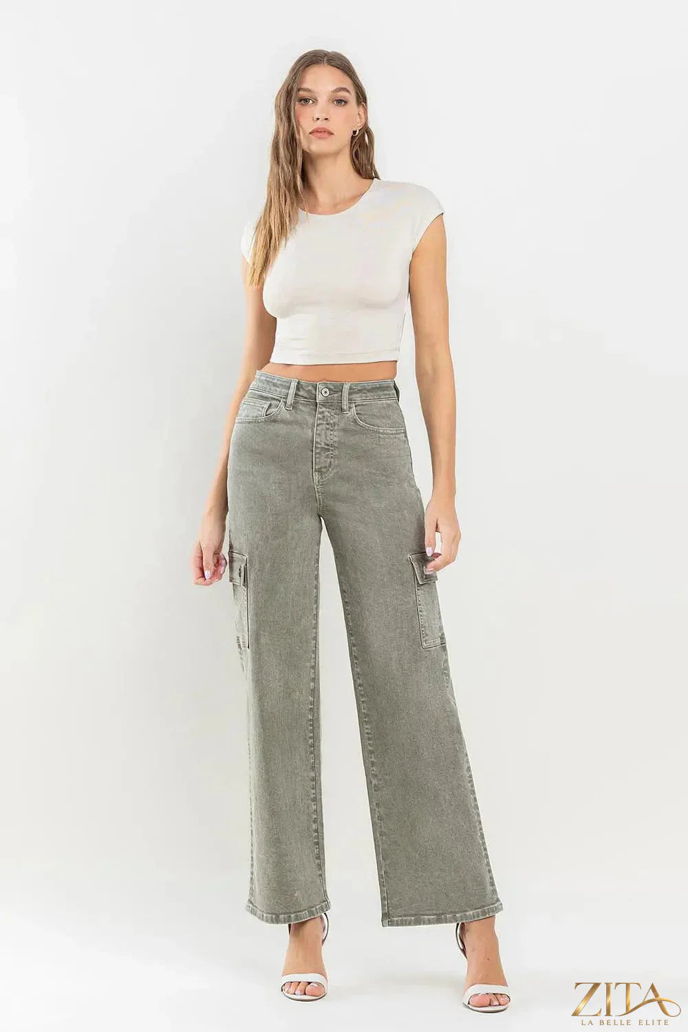 Vervet by Flying Monkey 90's super high-rise cargo jeans with multiple pockets, styled with a casual, vintage-inspired look.