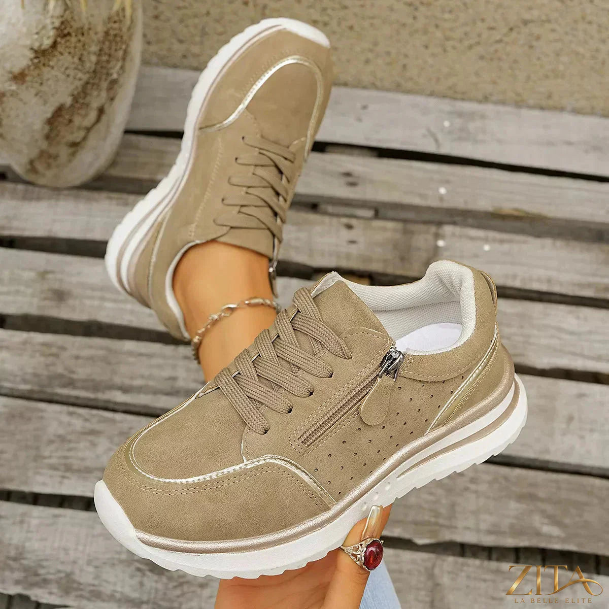 Zita La Belle Elite round toe lace-up sneakers in white with black accents, featuring stylish design and comfortable fit.