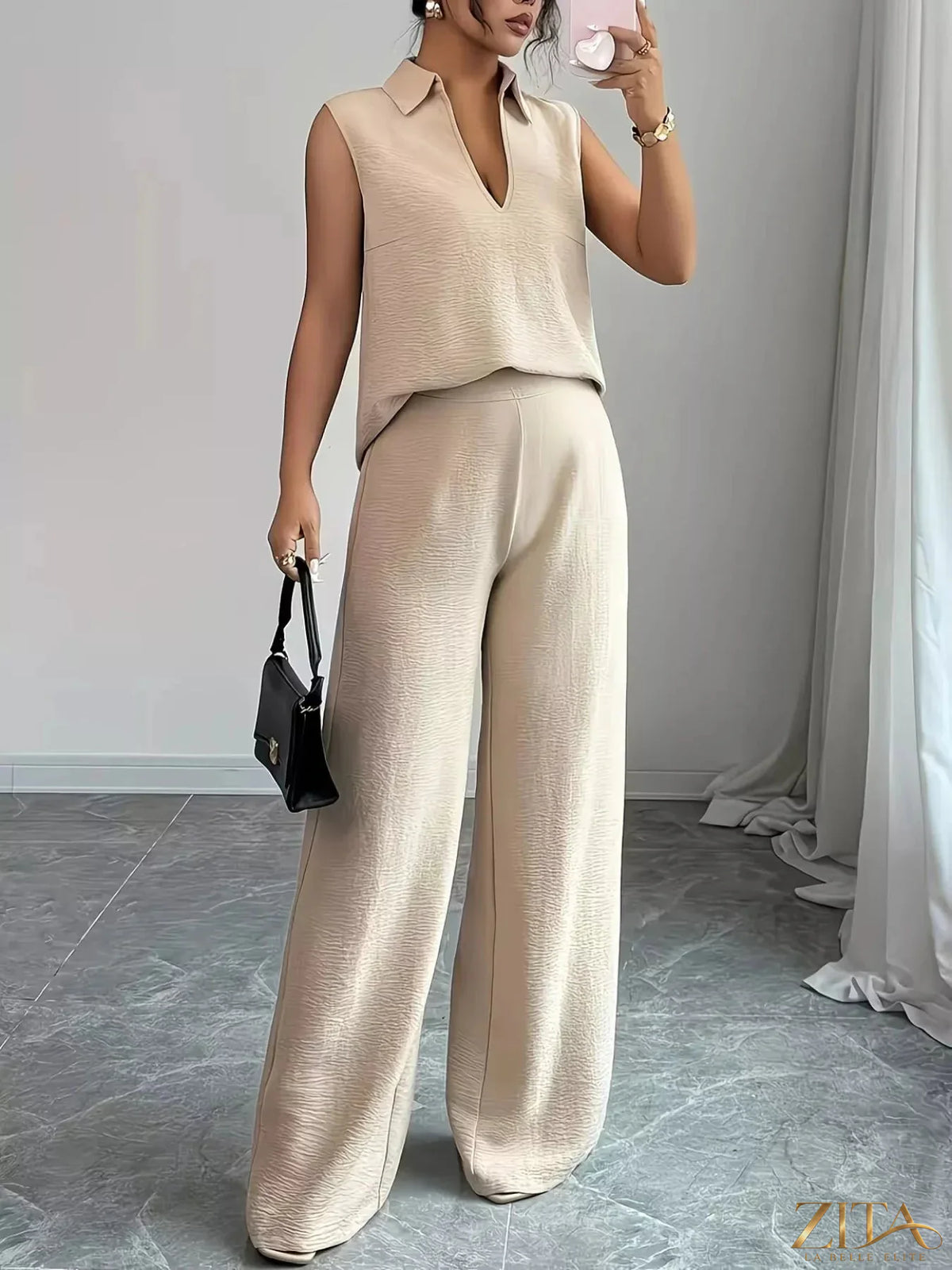 Zita La Belle Elite sleeveless top and wide-leg pants set, featuring a stylish sleeveless blouse and flowy wide-leg trousers.