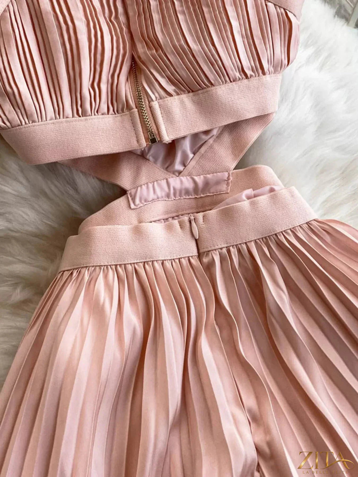 Zita La Belle Elite halter neck pleated maxi dress with flowing fabric and elegant design, shown on a model.
